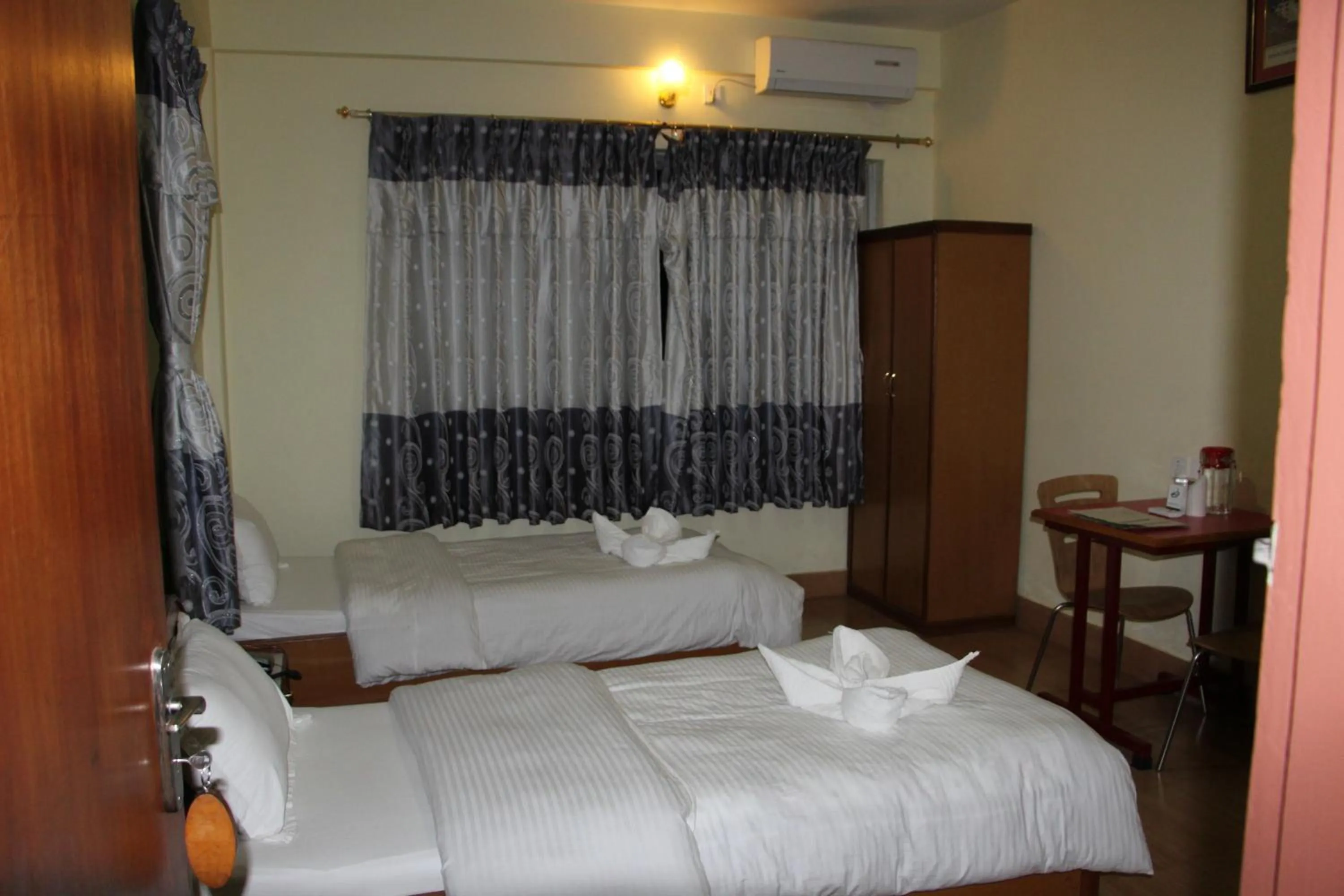 Bedroom in Hotel Milarepa Pvt Ltd