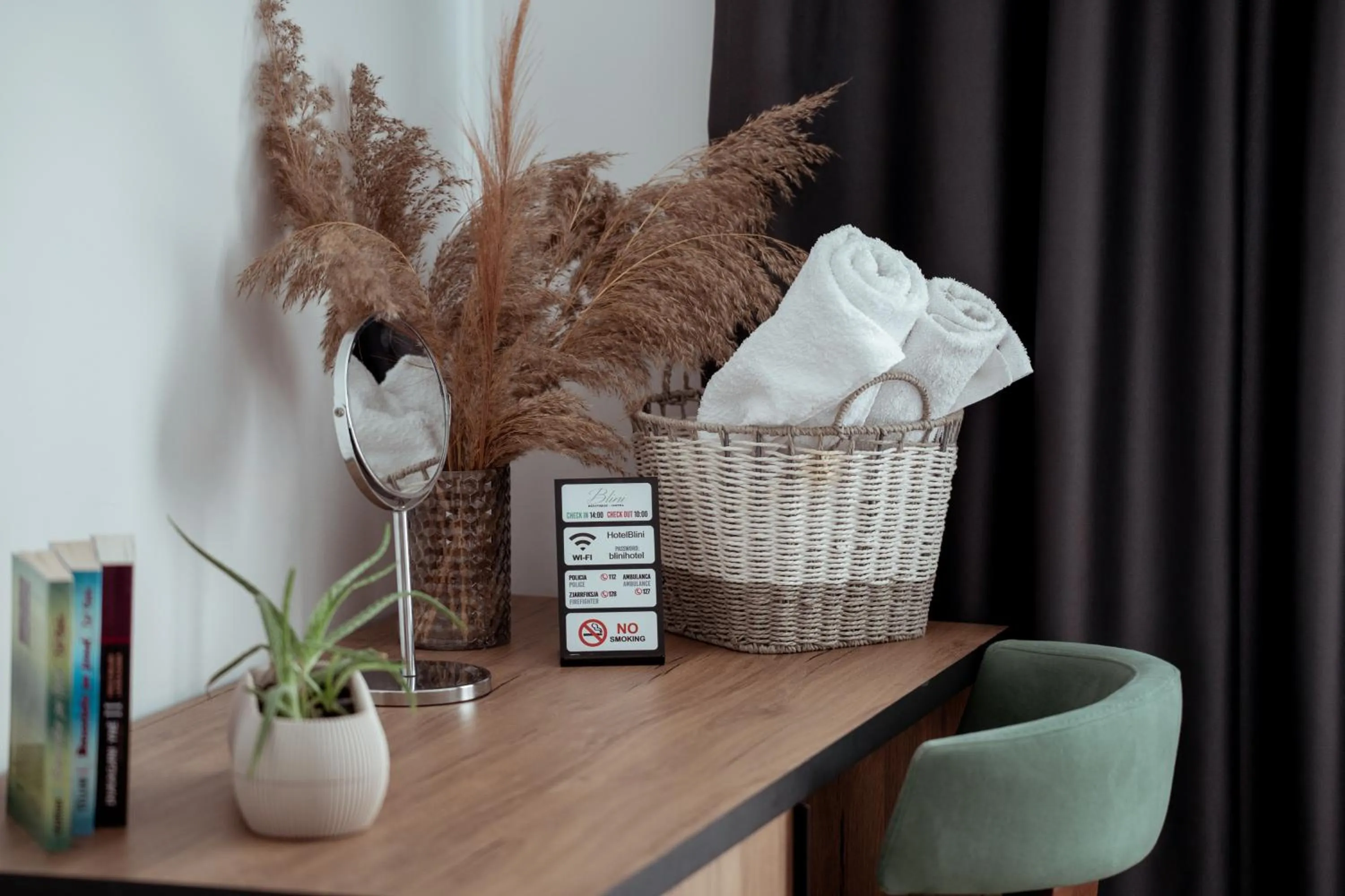 Property logo or sign in Hotel Blini