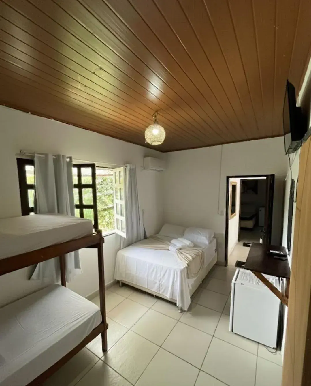 Economy Quadruple Room in Pousada Arraial da Poesia Economy Quadruple Room in Pousada Arraial da Poesia