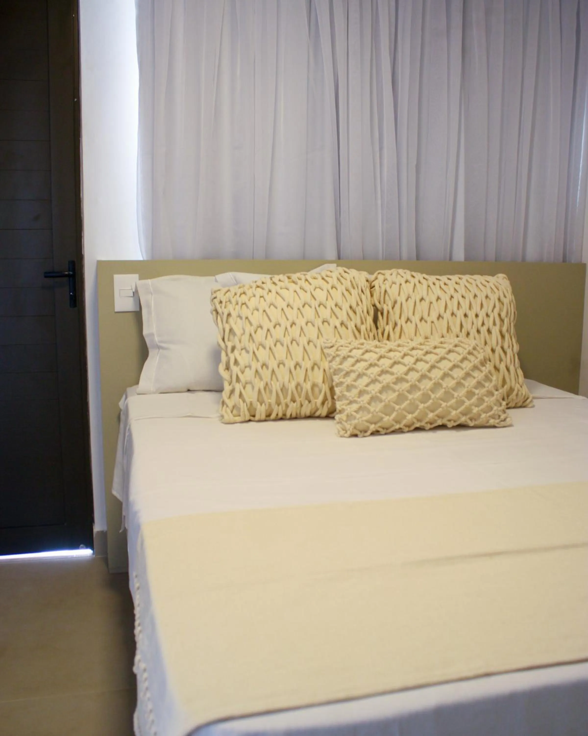 Bed in The Home São Miguel do Gostoso by Liiv