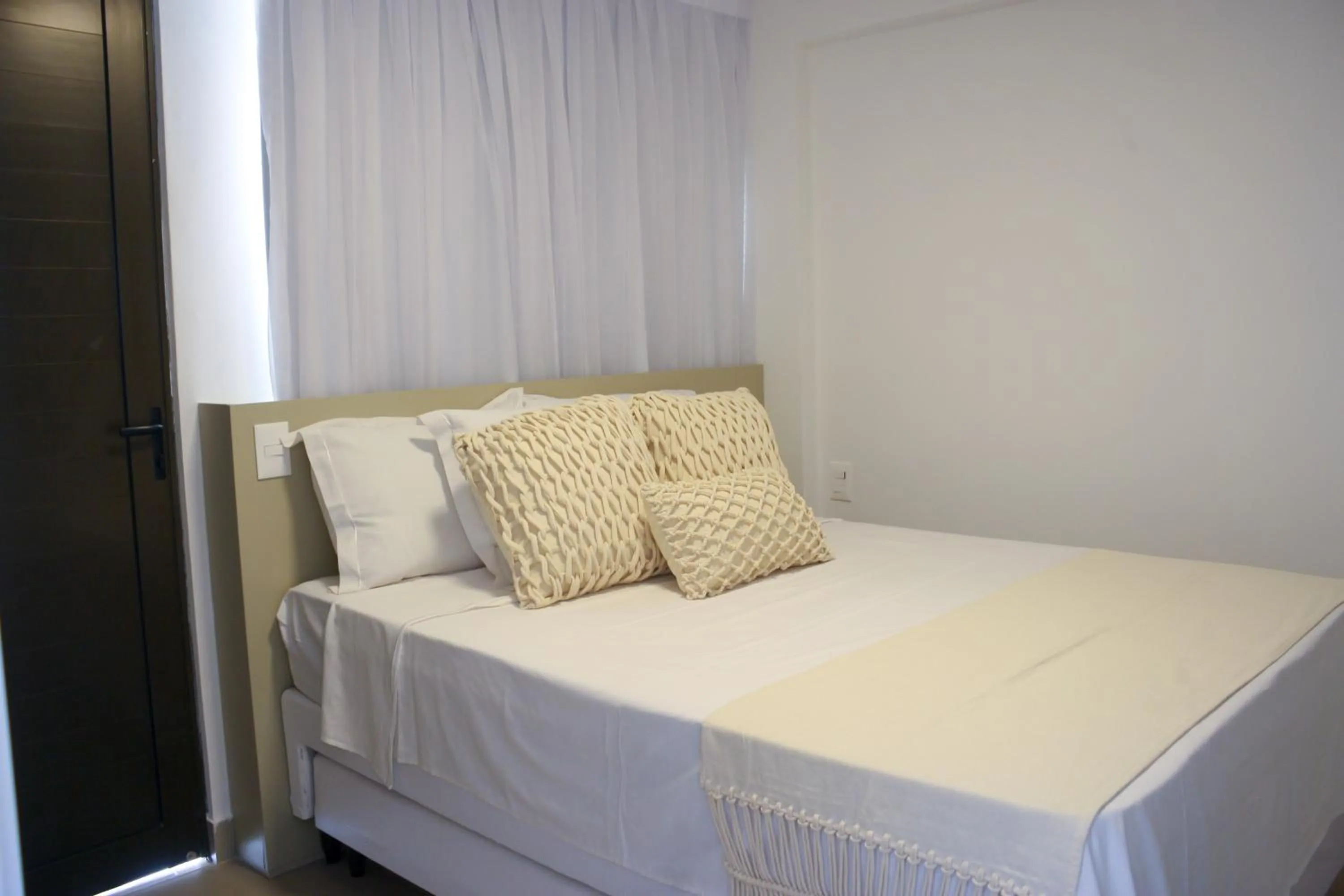 Bed in The Home São Miguel do Gostoso by Liiv