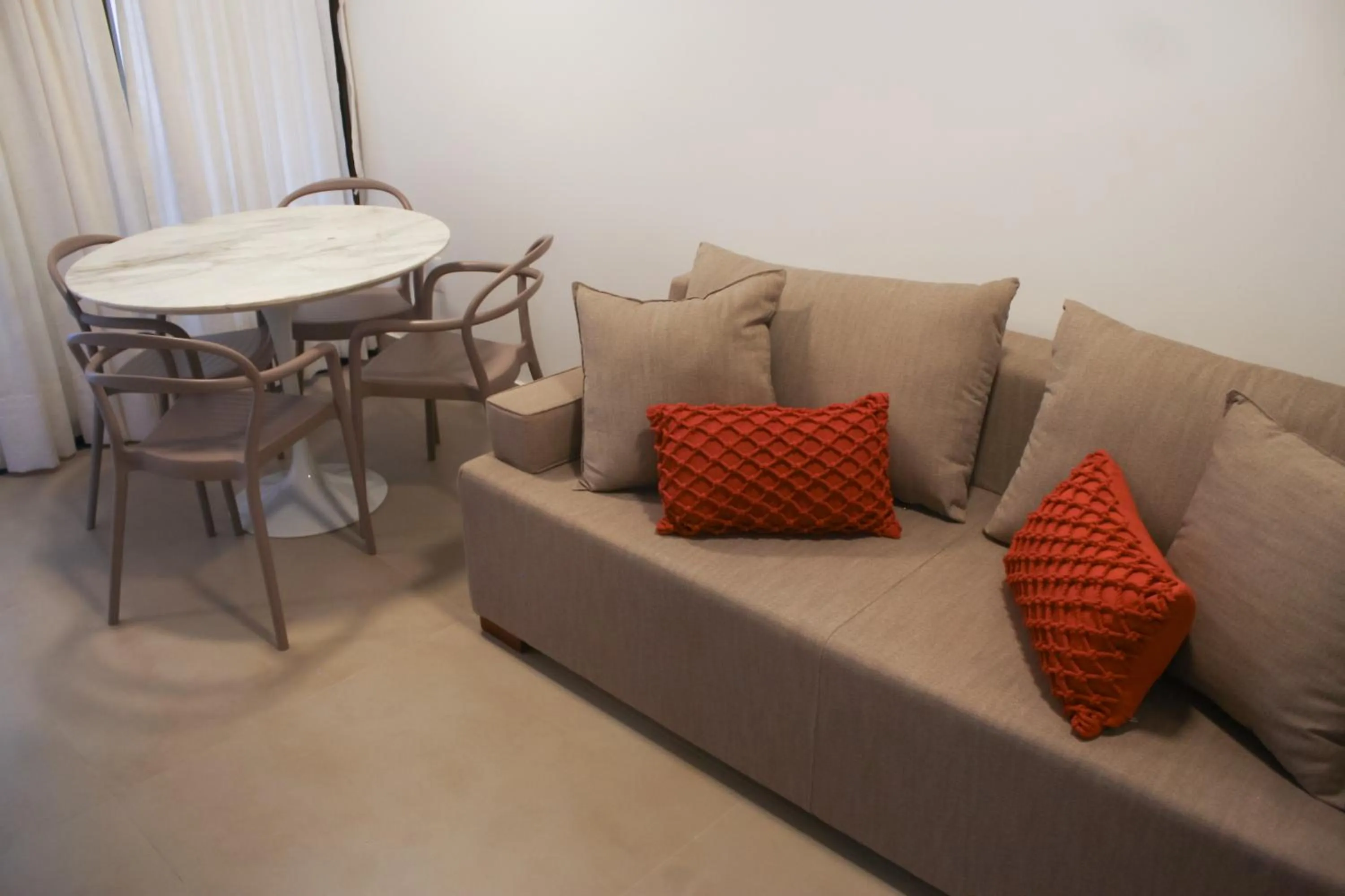 Living room in The Home São Miguel do Gostoso by Liiv