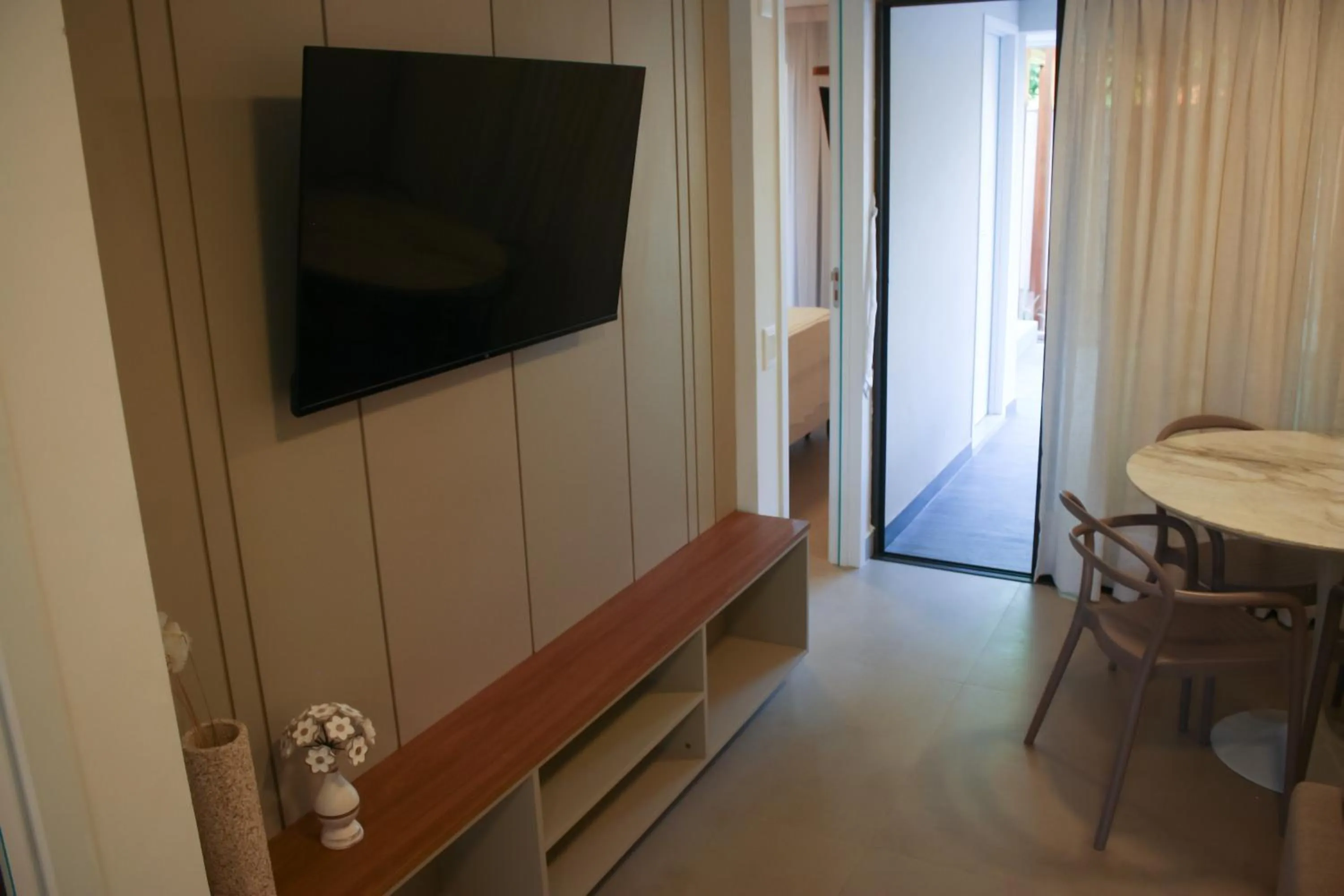 TV and multimedia in The Home São Miguel do Gostoso by Liiv