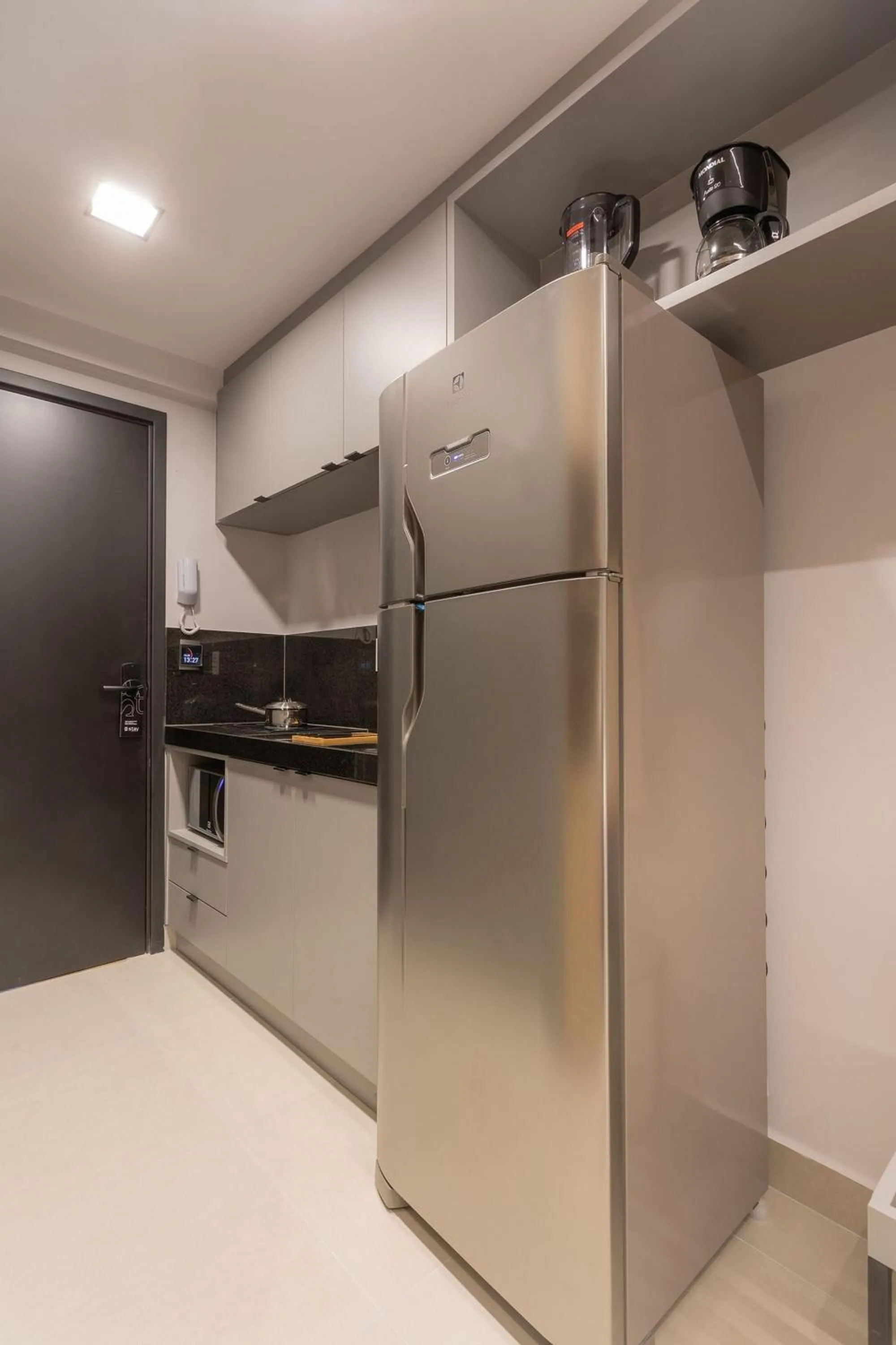 Kitchen or kitchenette in Way Bossa #F2 - Studio no Bessa By Carpediem