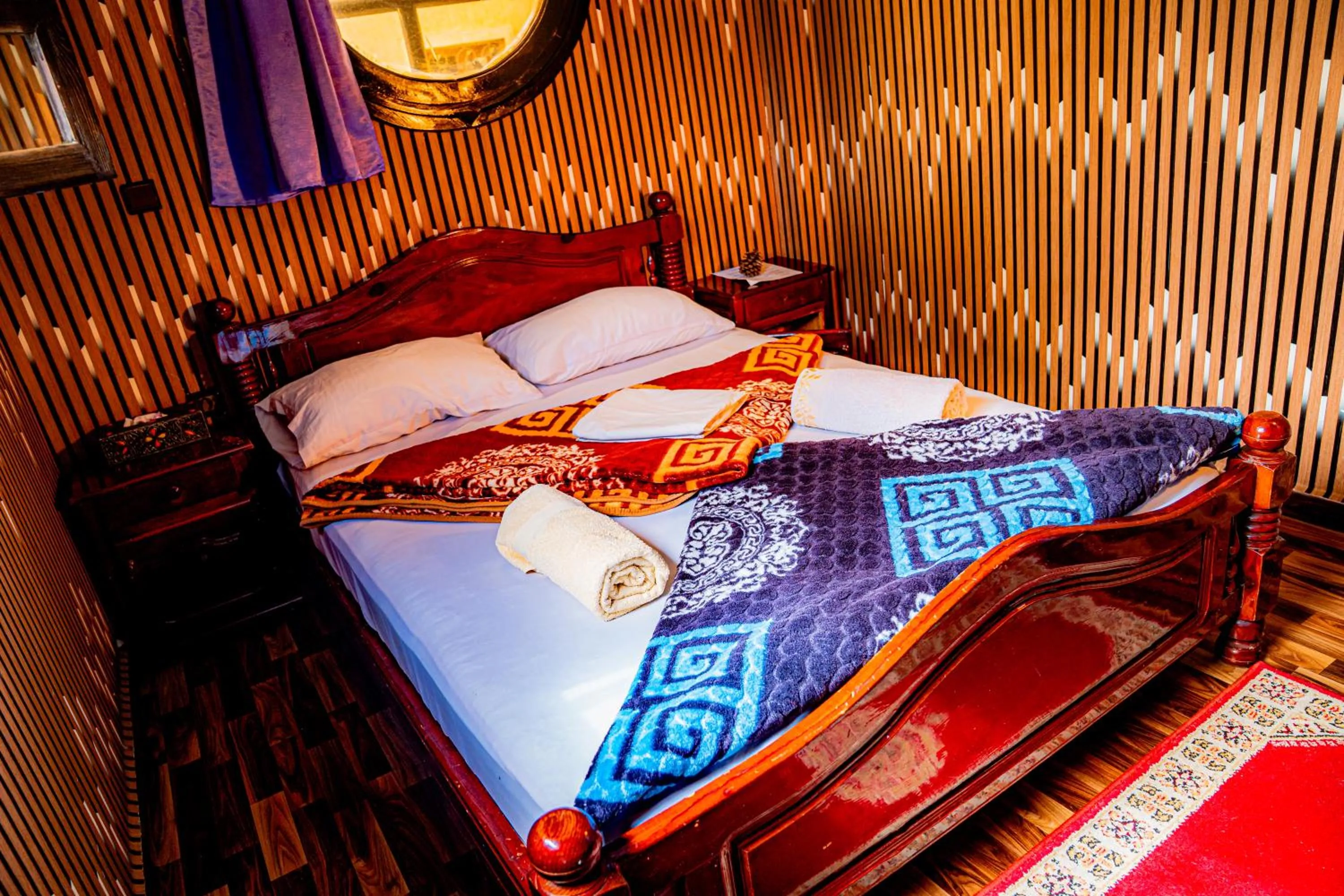 Bed in Dinosaur Anza Surf House