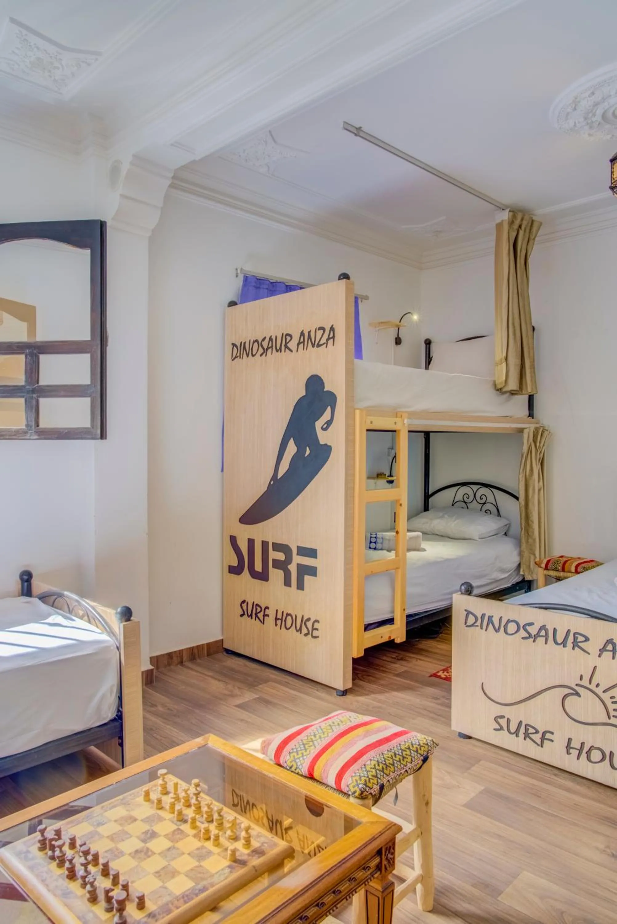 Bed in Dinosaur Anza Surf House