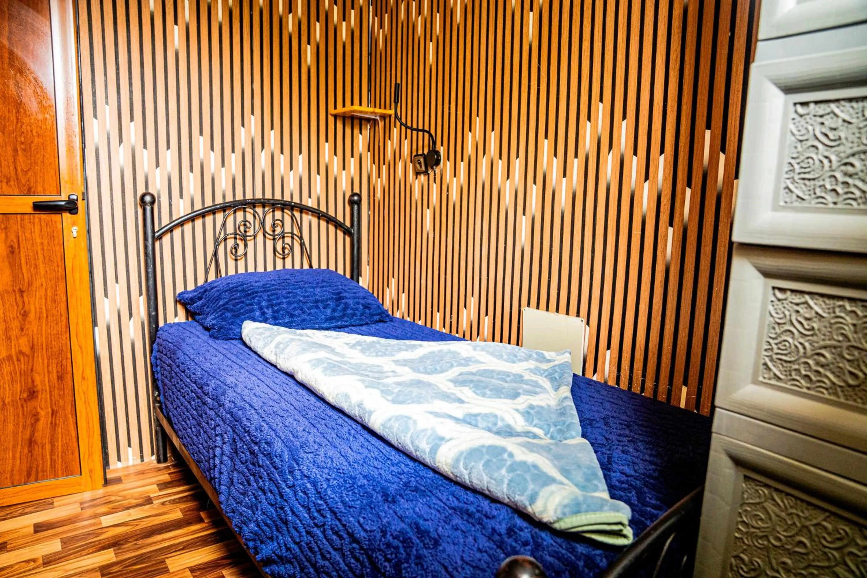 Bed in Dinosaur Anza Surf House