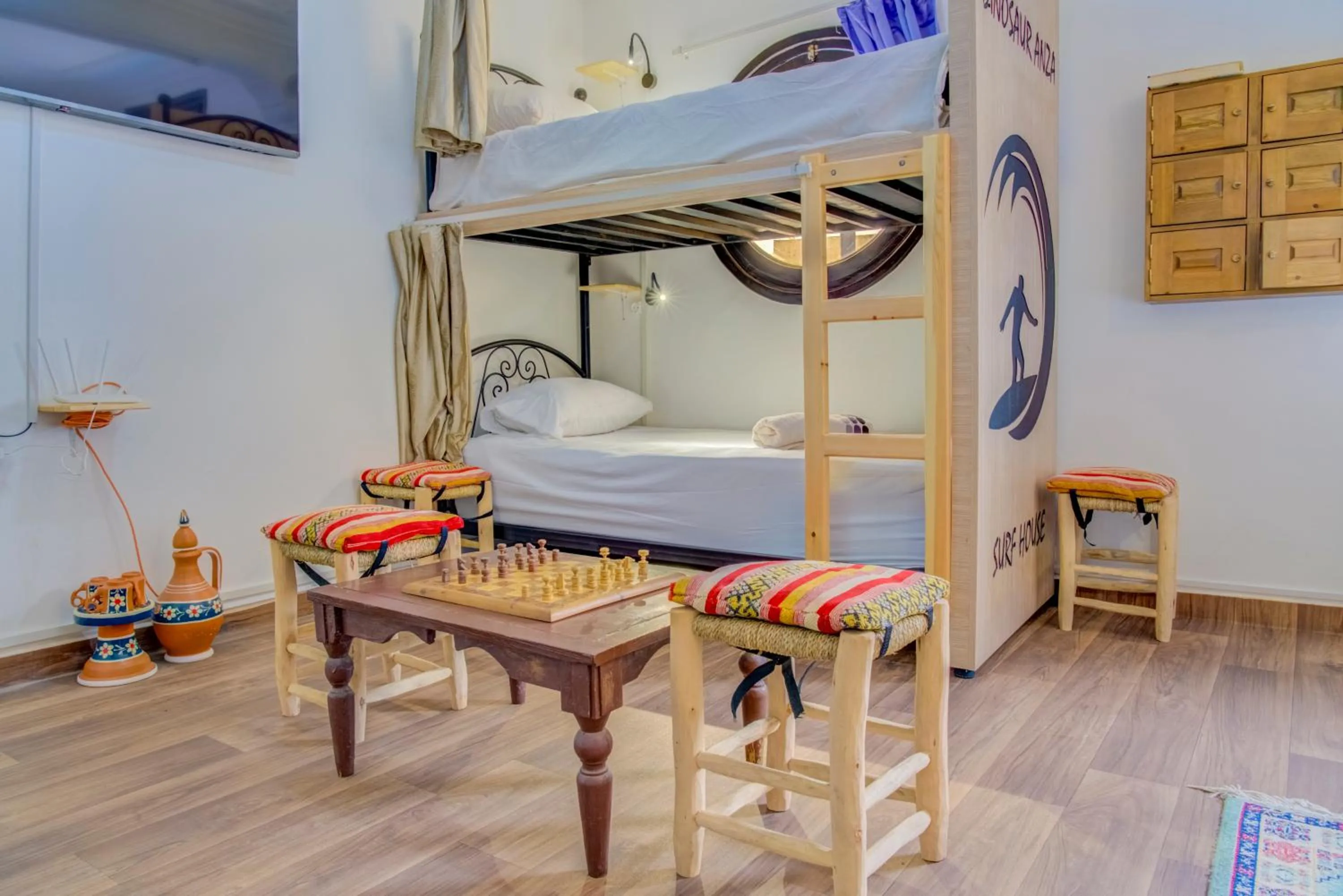 Bed in Dinosaur Anza Surf House