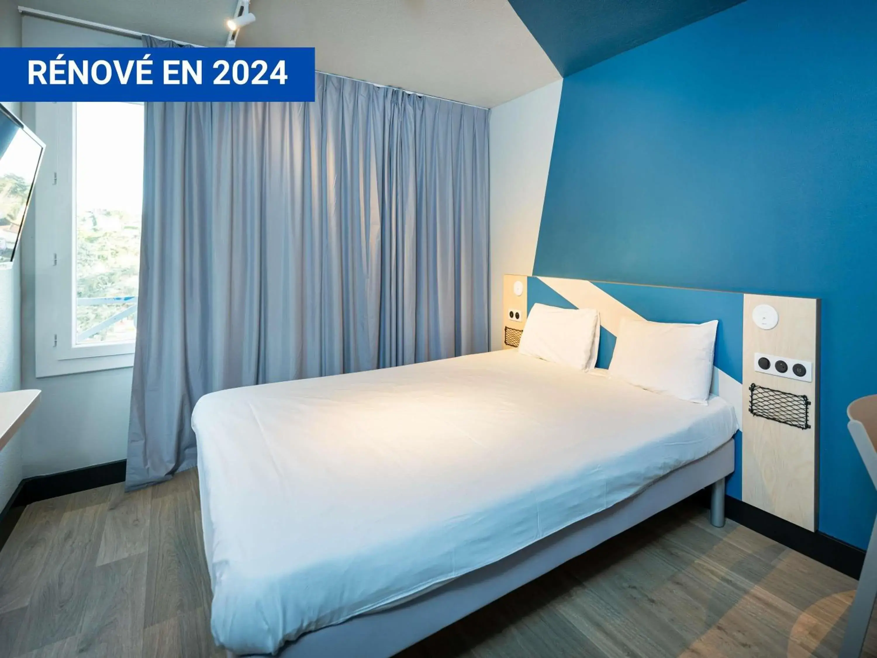 Bedroom, Bed in Ibis Budget Lyon Caluire Cité Internationale Bedroom, Bed in Ibis Budget Lyon Caluire Cité Internationale