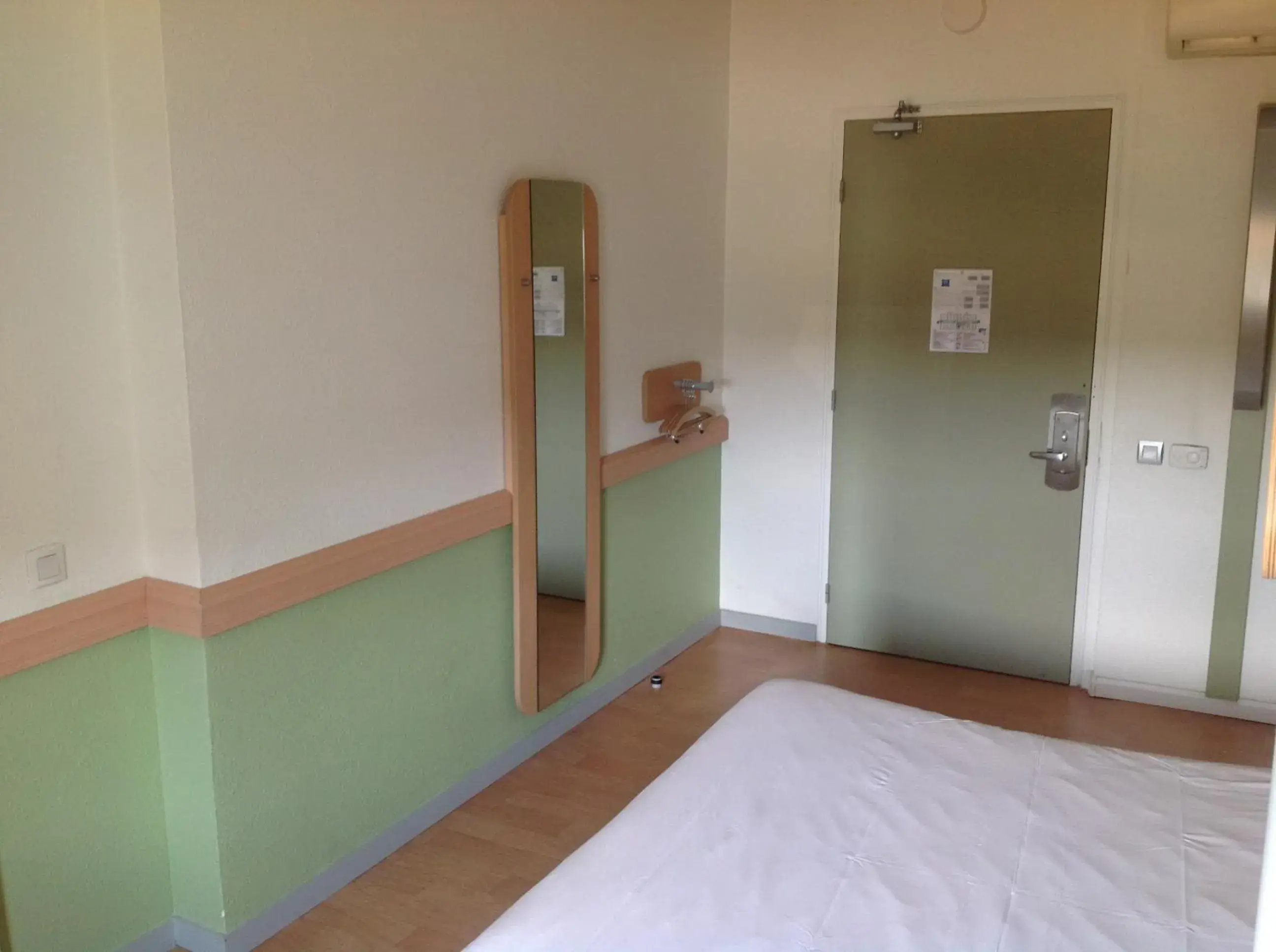 Decorative detail, Bed in ibis budget Orgeval Decorative detail, Bed in ibis budget Orgeval