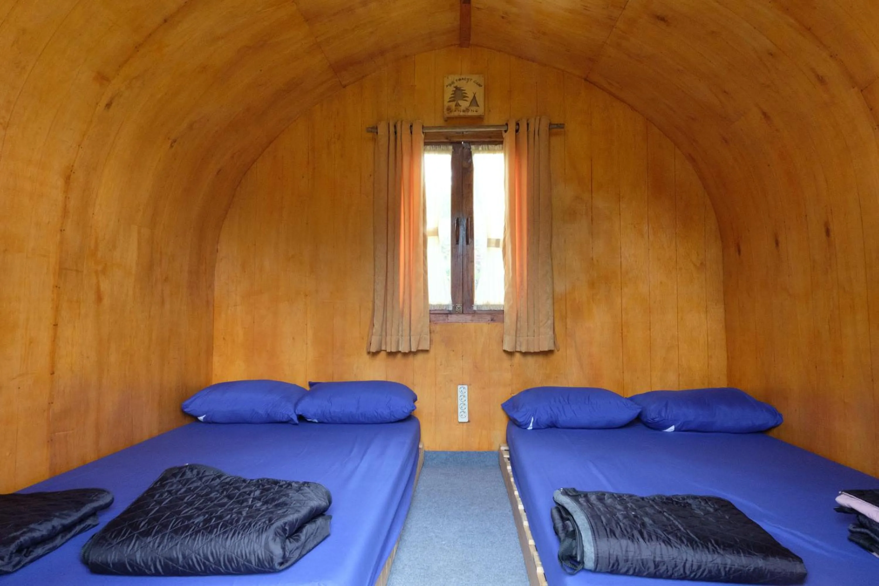 Bed in Hilltop Camp, Lembang