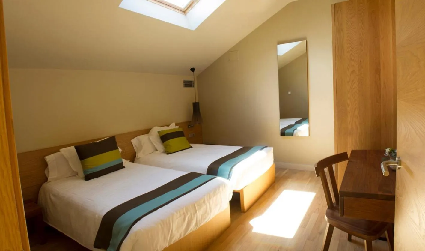 Photo of the whole room, Bed in Apartaments Vall de Núria