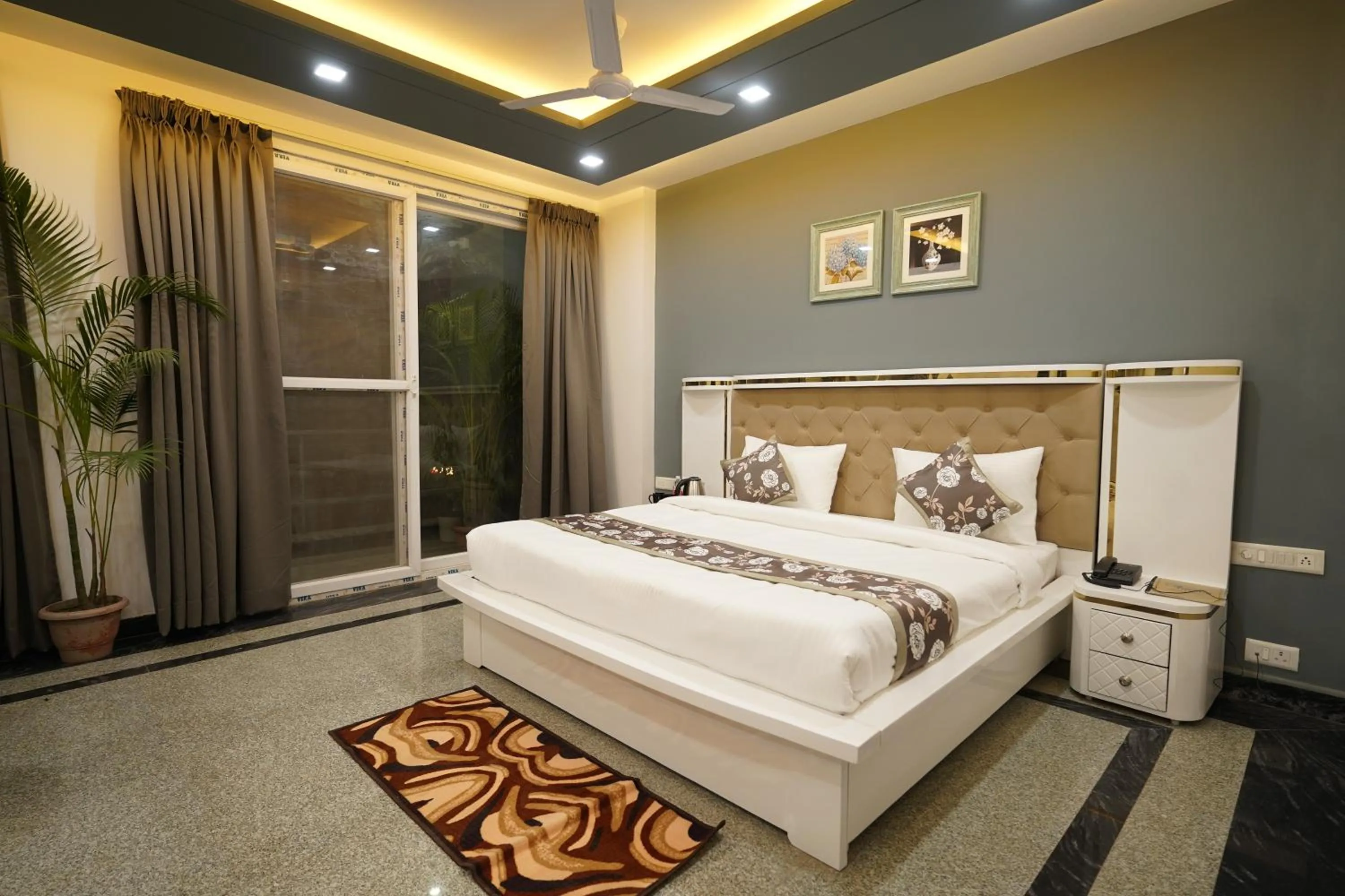 Bedroom, Bed in Posh Garden Inn Artemis Hospital Road Gurgaon