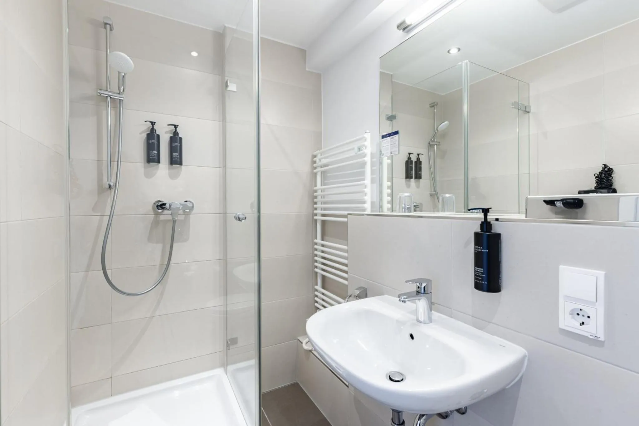 Bathroom in Candlewood Suites Fürth by IHG