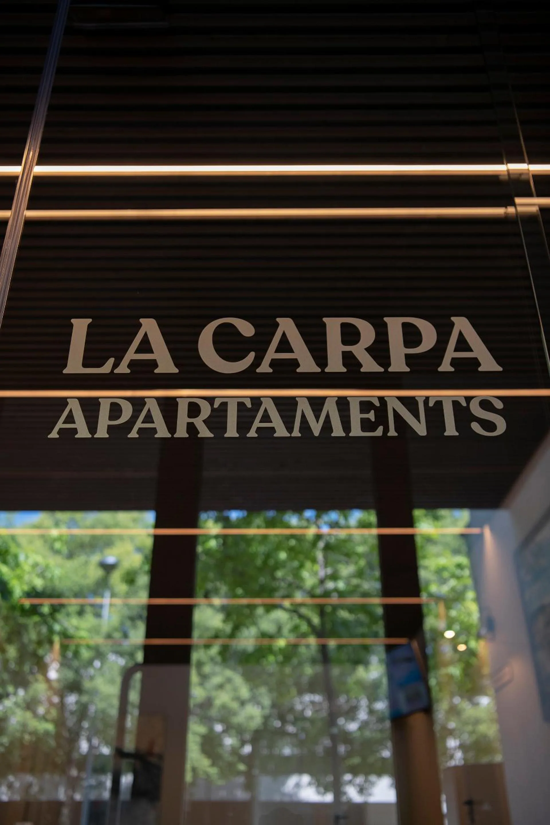 Property logo or sign in APARTAMENTS LA CARPA