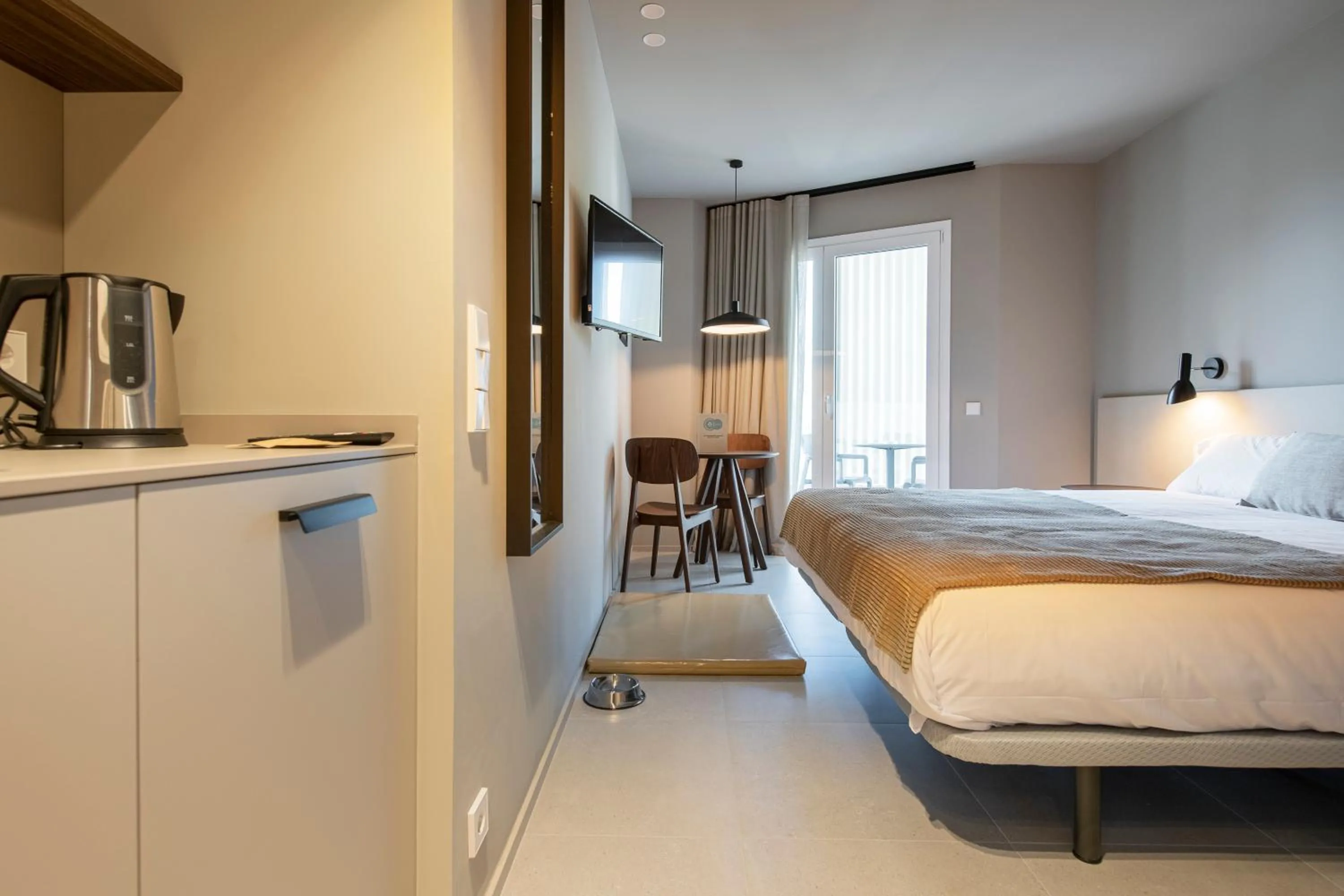 Bed in APARTAMENTS LA CARPA