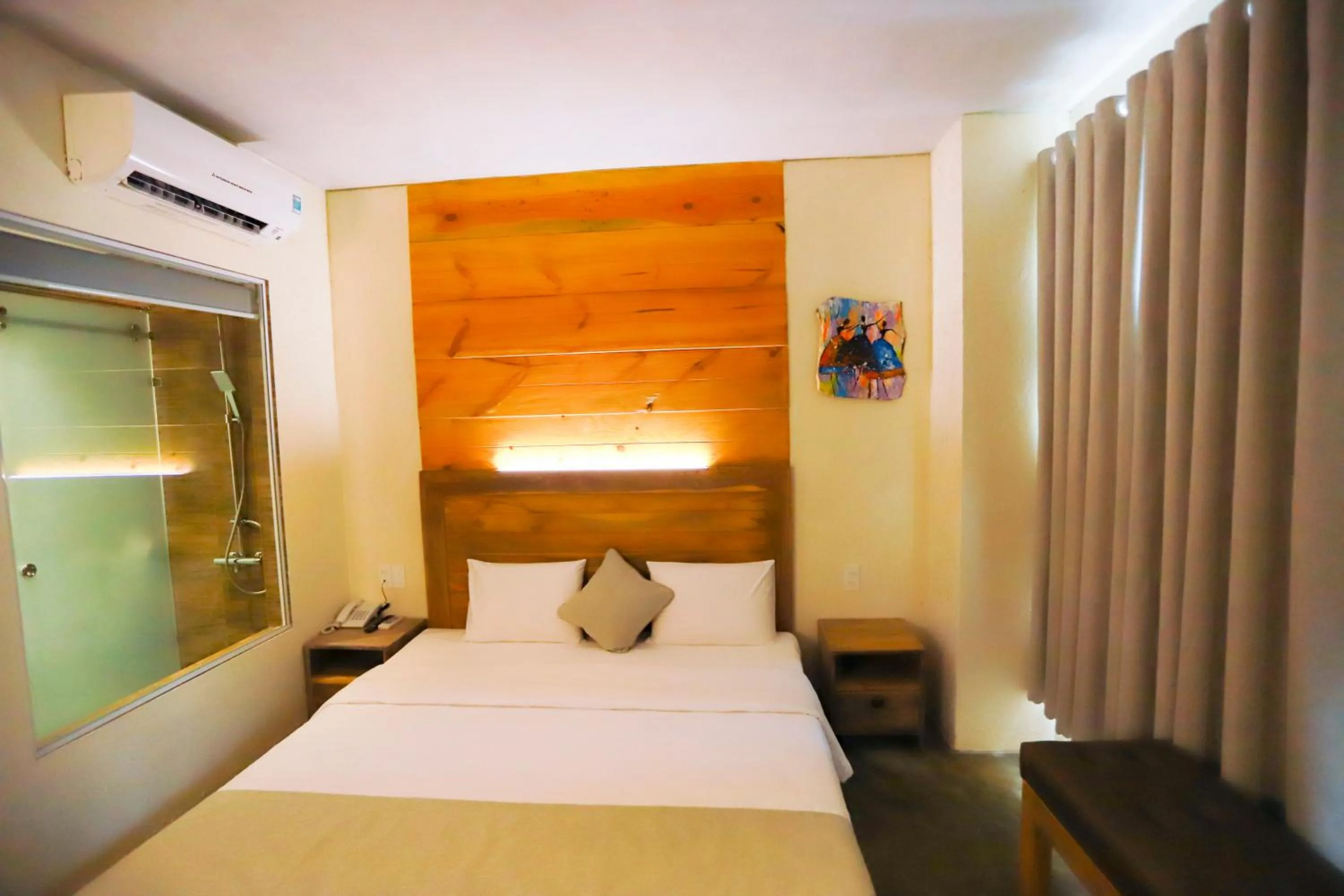 Bed in Rustic Hotel Quy Nhon Powered by ASTON
