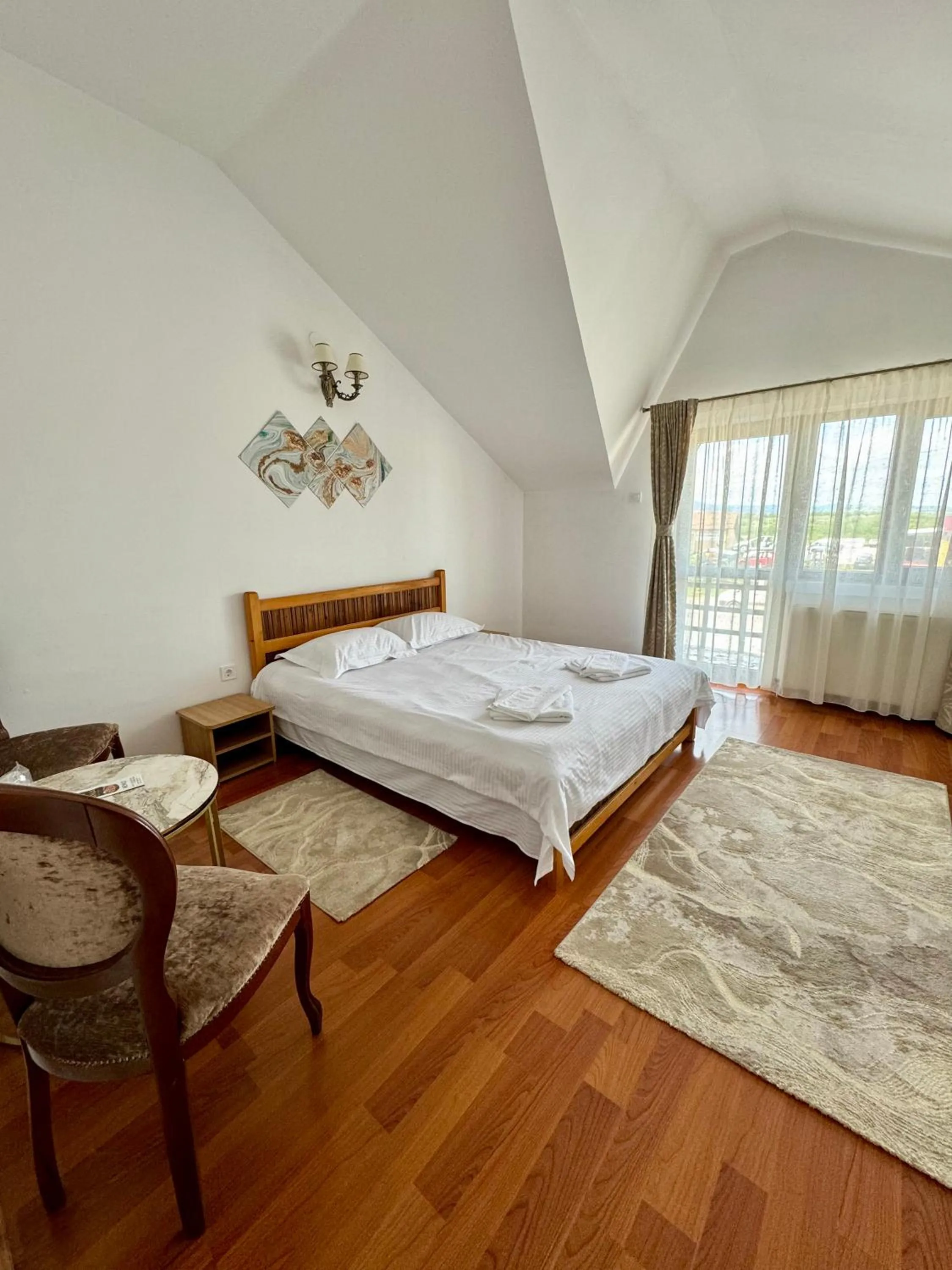 Bed in PENSIUNEA ANA