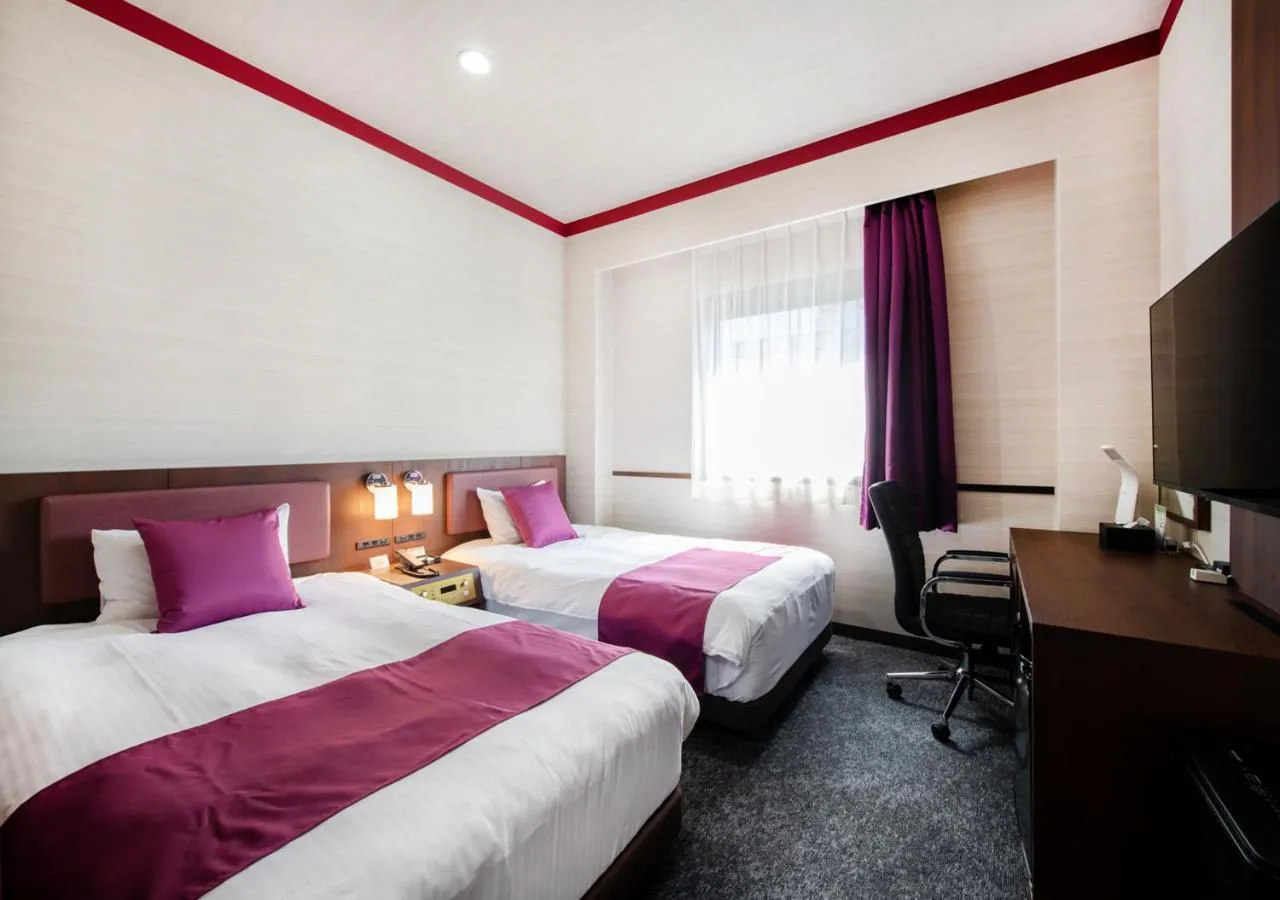 Bed in TKP Sunlife Hotel