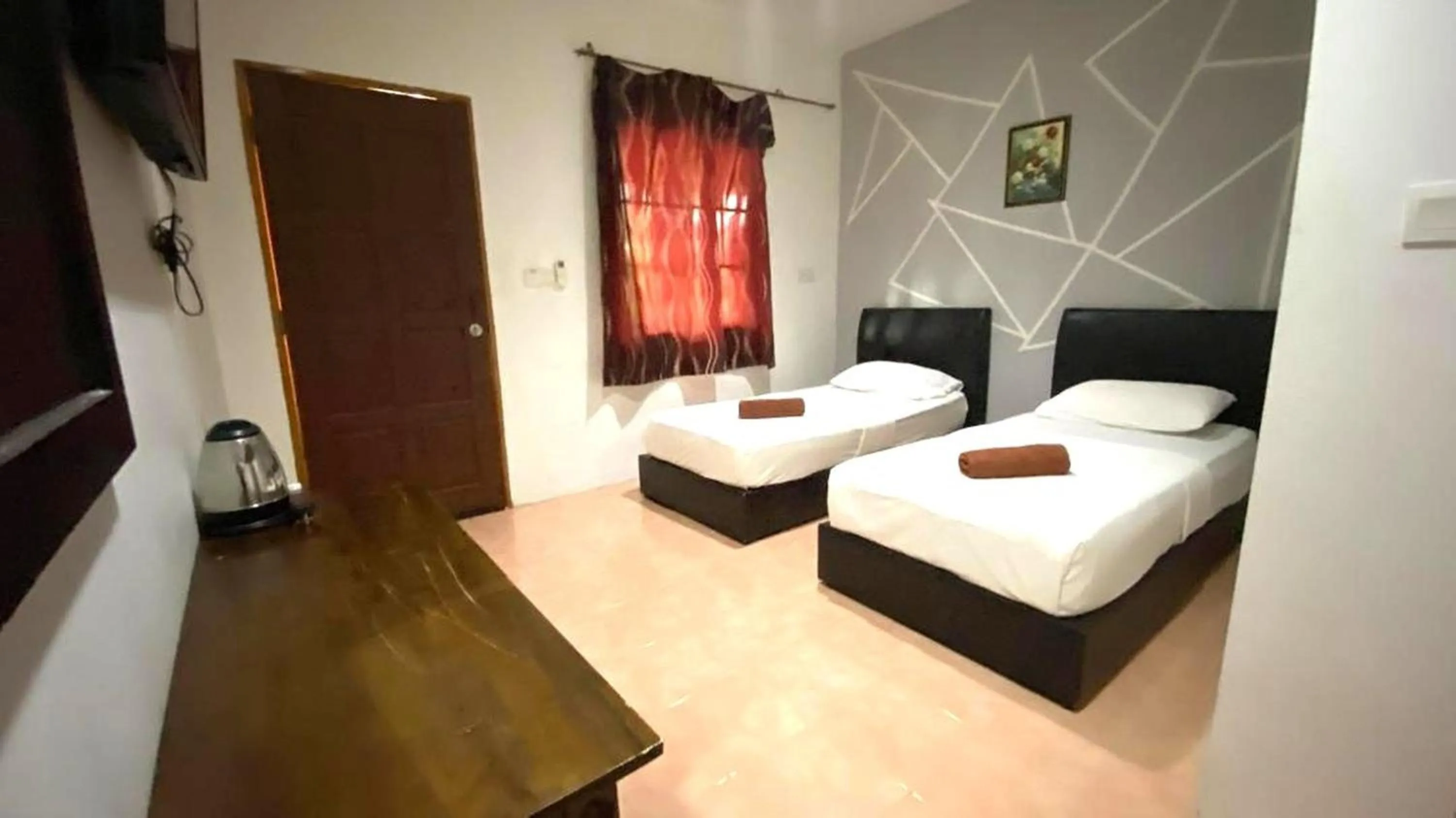 Bedroom, Bed in Capital O 91246 Tokman Inn