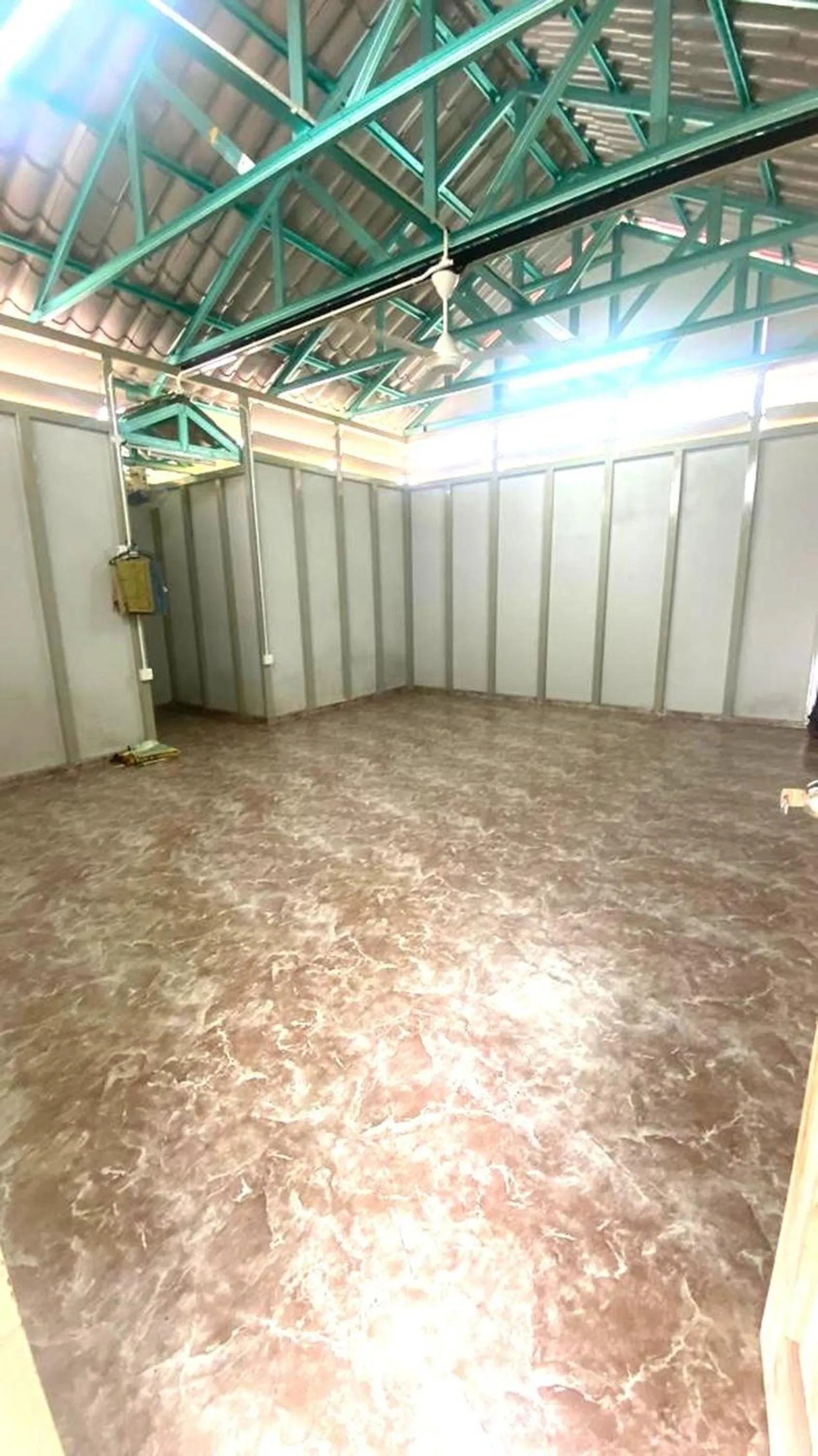 Living room in Capital O 91246 Tokman Inn