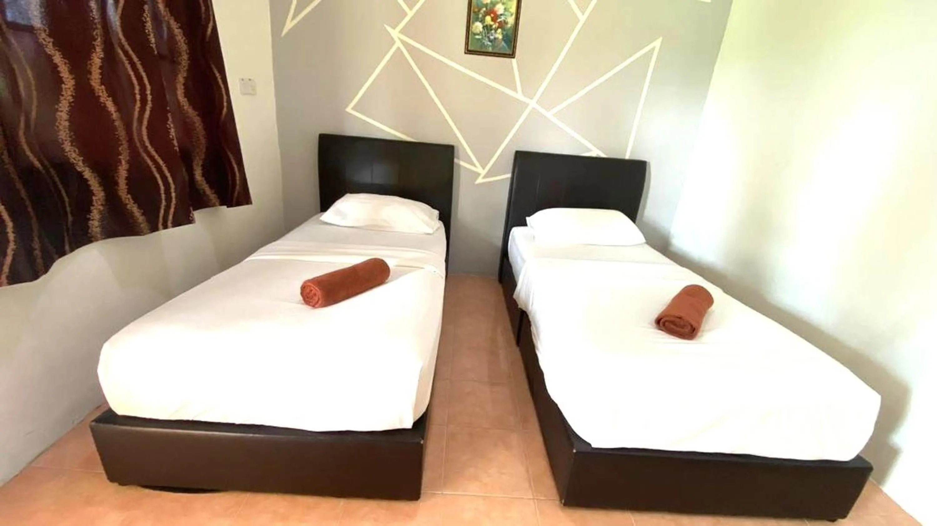 Photo of the whole room, Bed in Capital O 91246 Tokman Inn