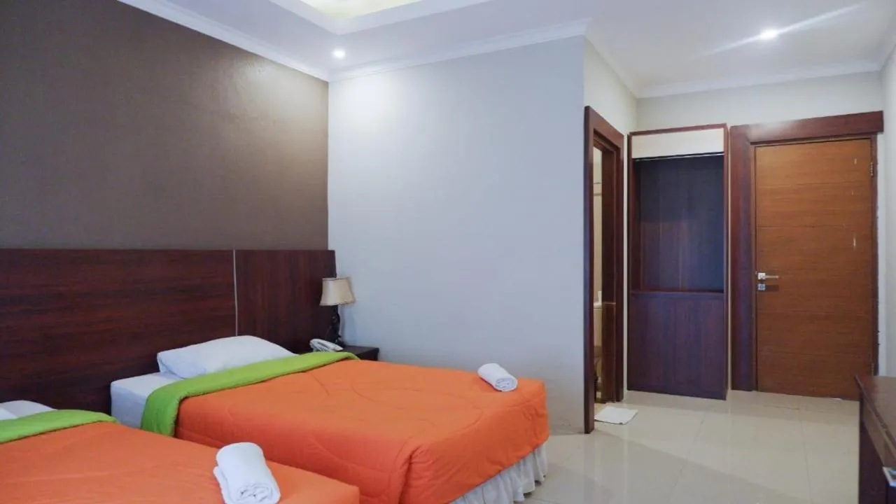 Bed in Bumi Gumati Resort & Convention