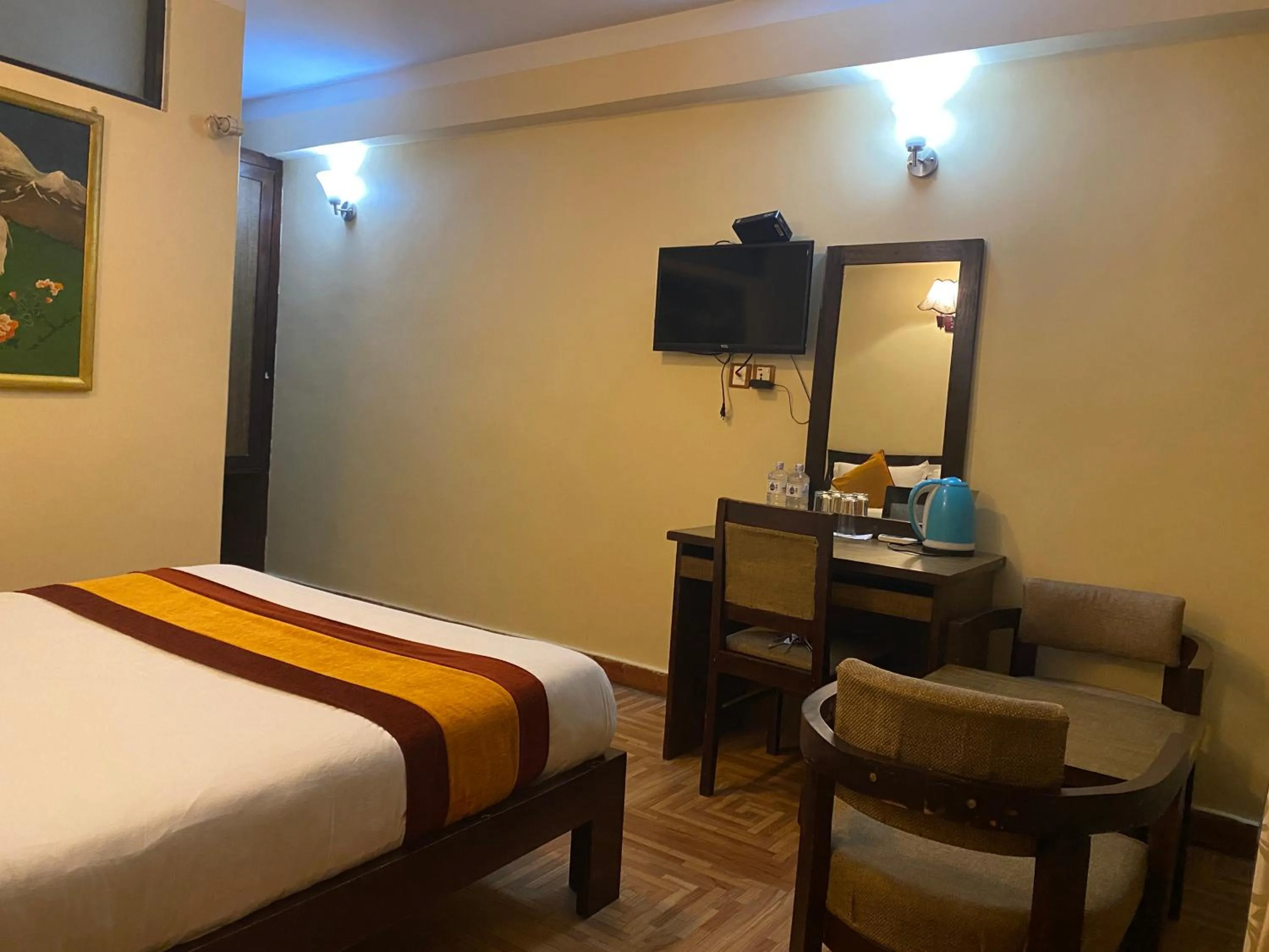 Seating area, Bed in Boudha Stupa View Guest House