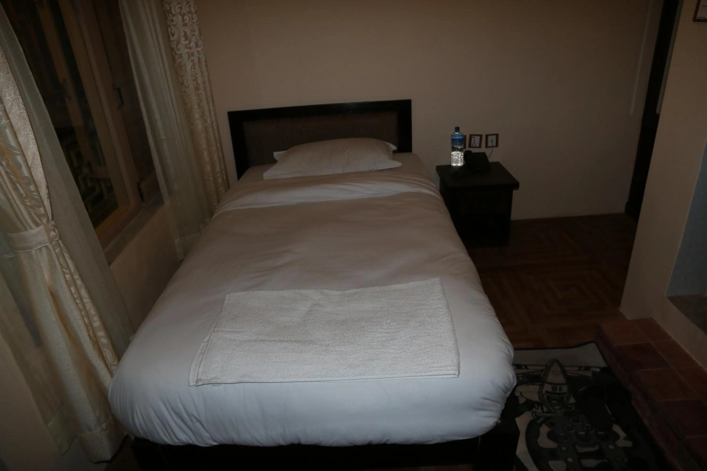 Bed in Boudha Stupa View Guest House
