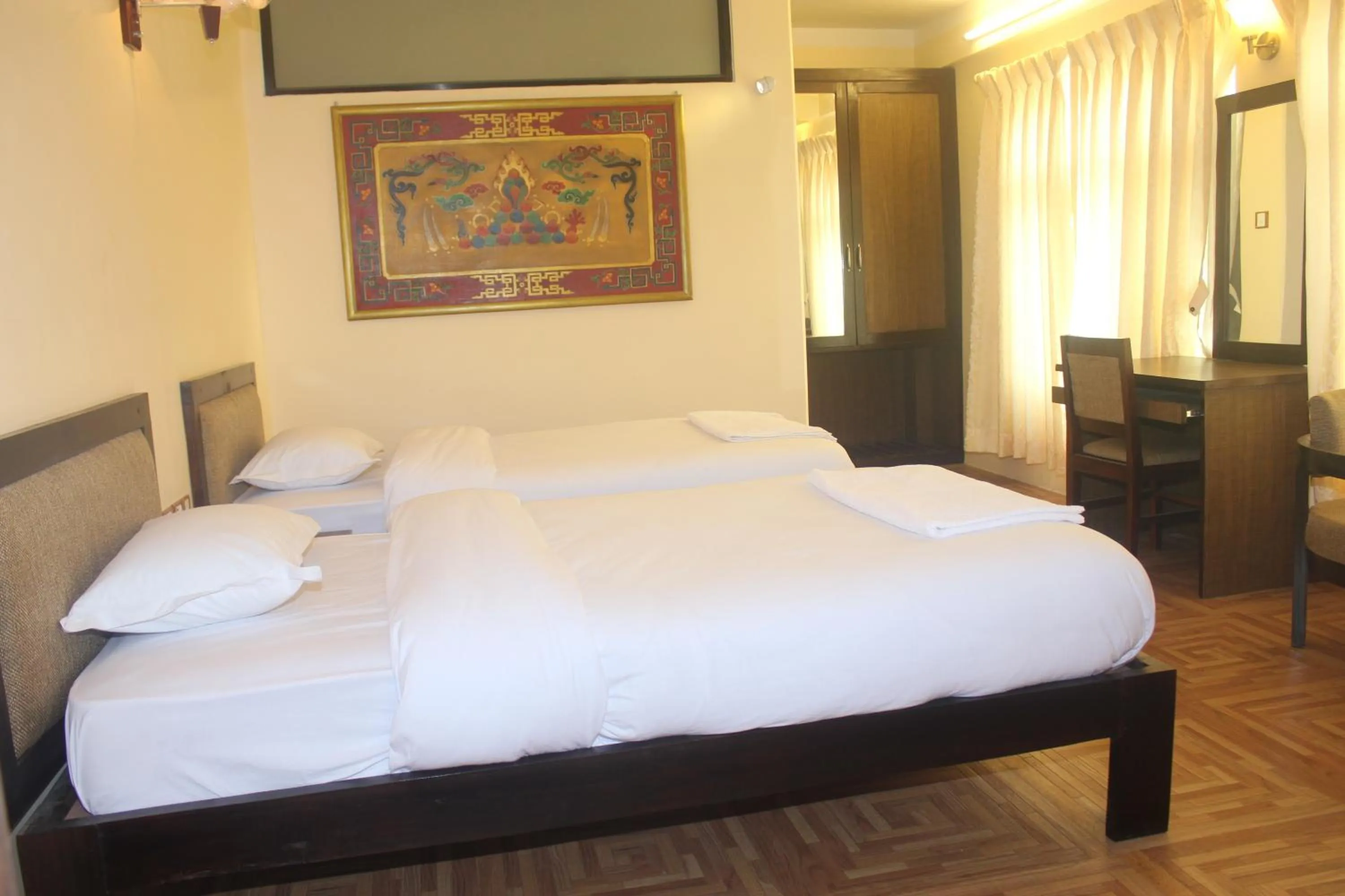 Photo of the whole room, Bed in Boudha Stupa View Guest House
