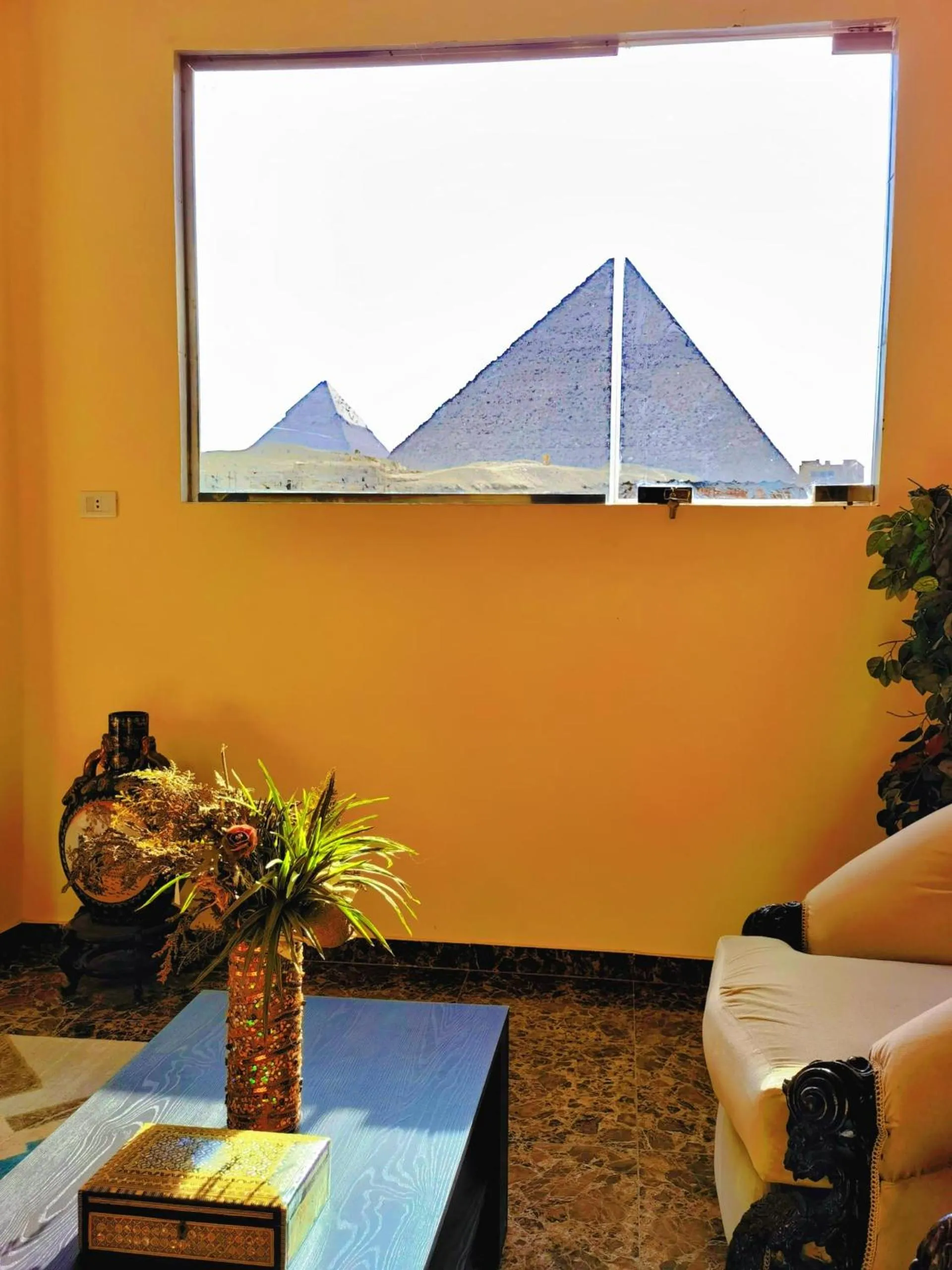 Living room in Energy Of Pyramid Hotel