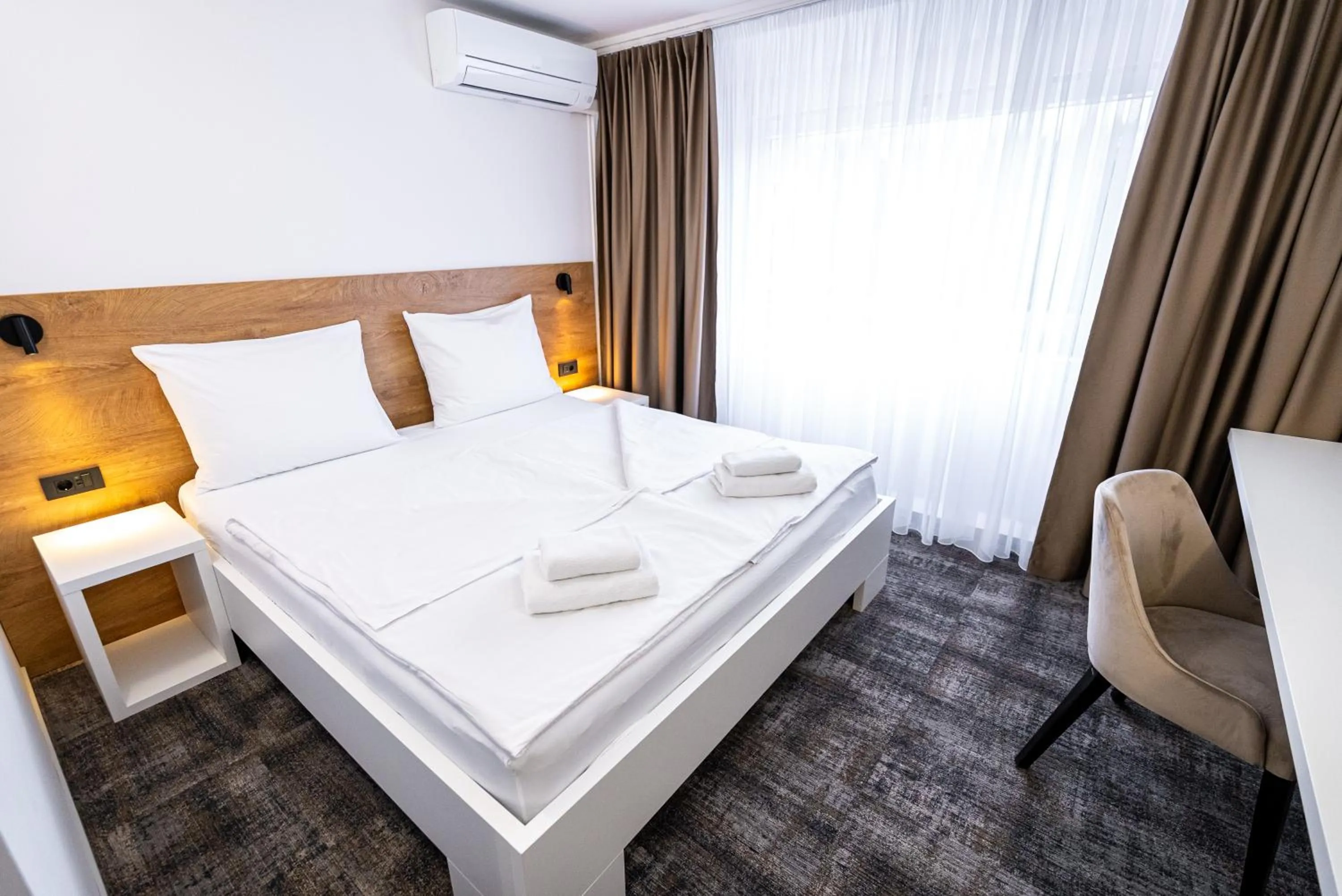 Bed in City Hotel Krško