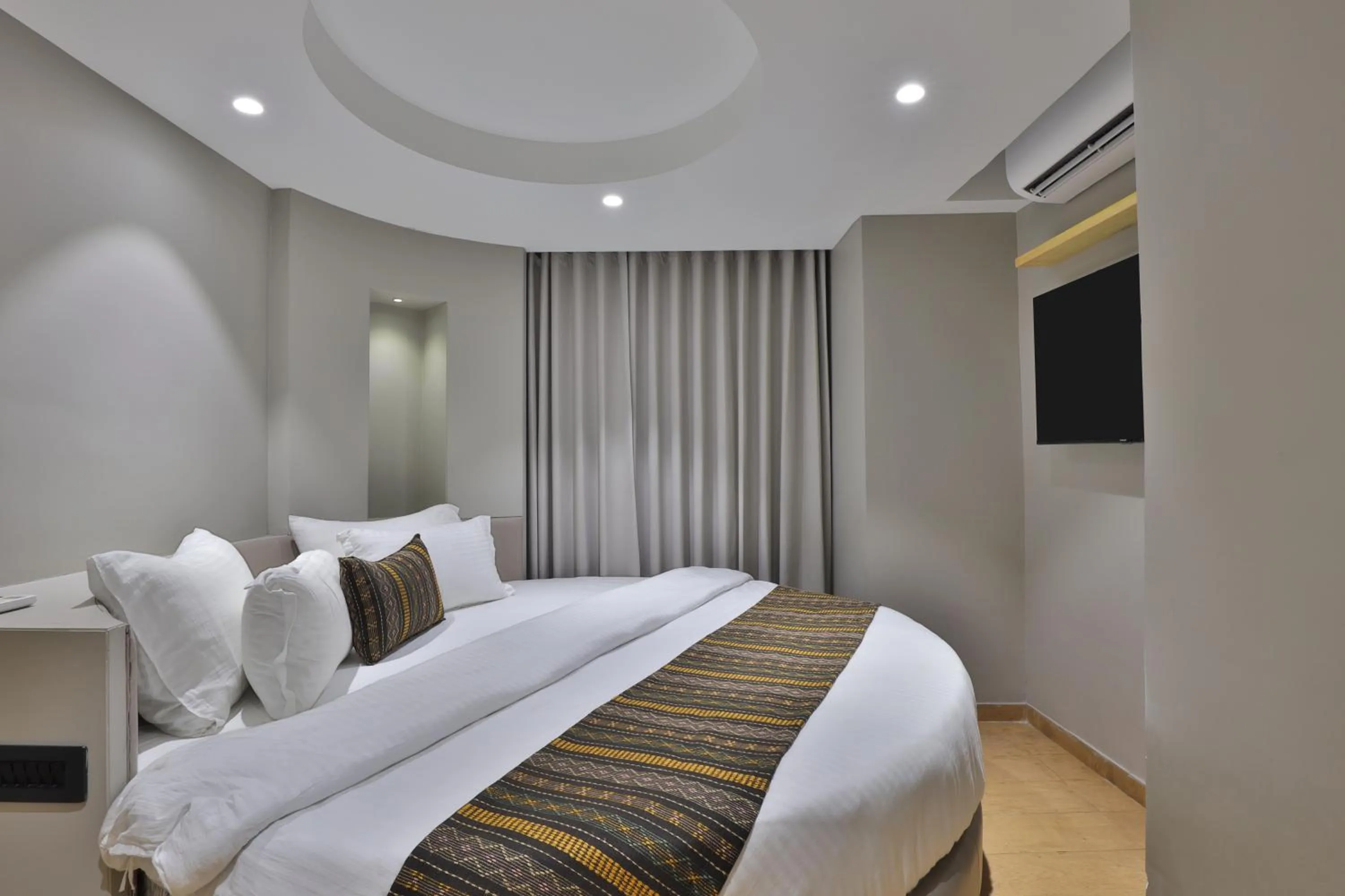 Bed in Hotel Shivashish