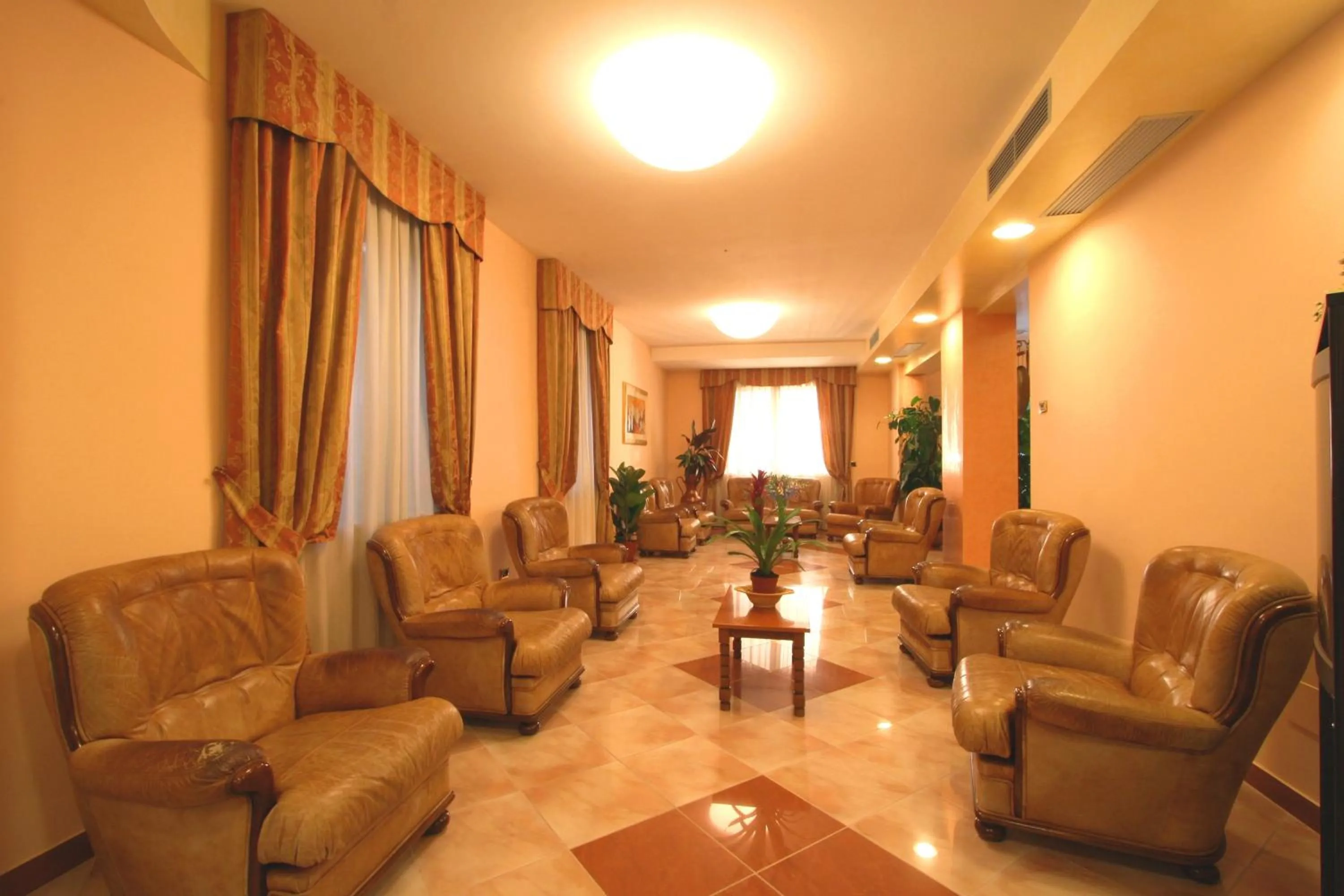 Communal lounge/ TV room in Hotel Villa Luca