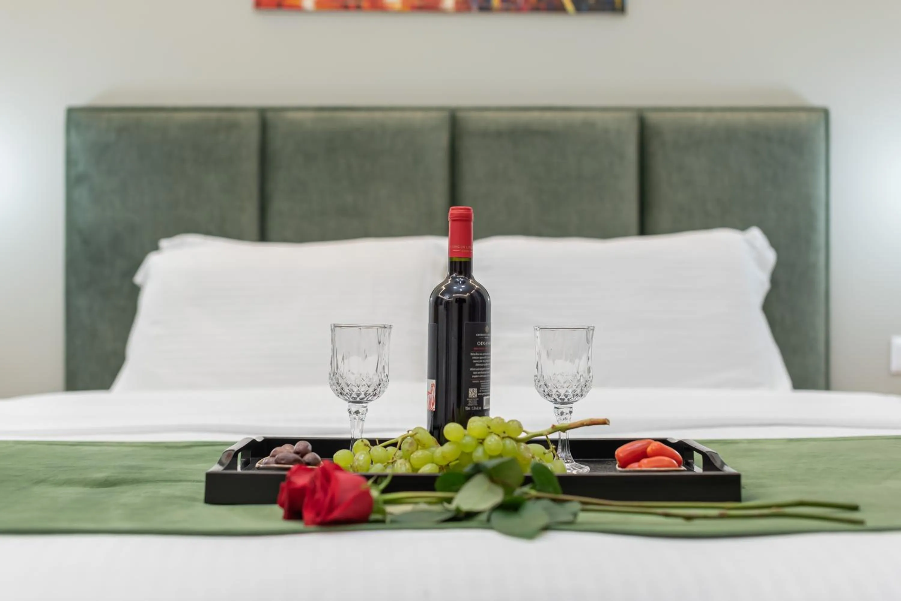 Bed in Acropolis Divine Apartments