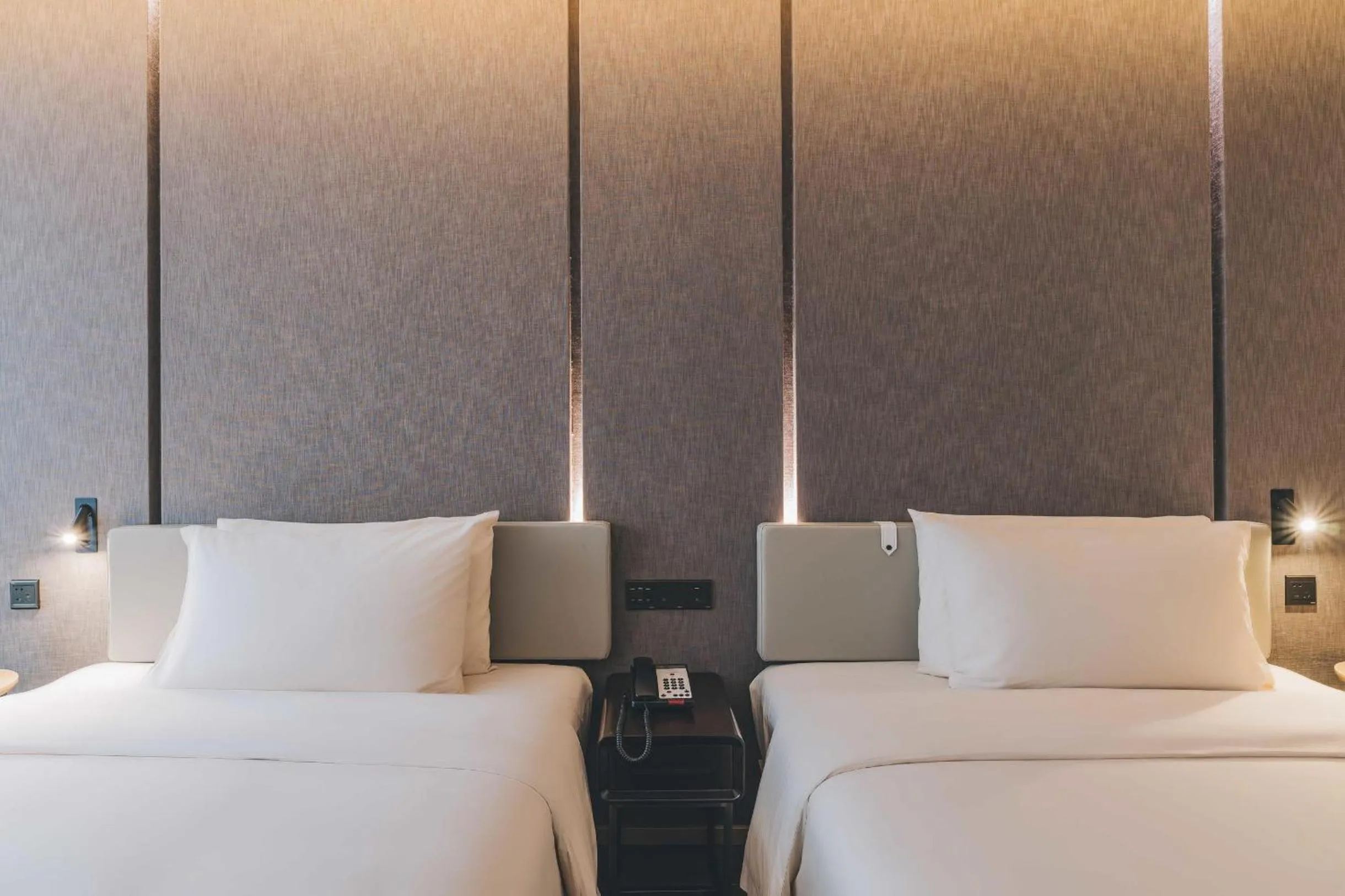 Bed in Atour Hotel Shanghai Hongqiao International Exhibition Linkong Park