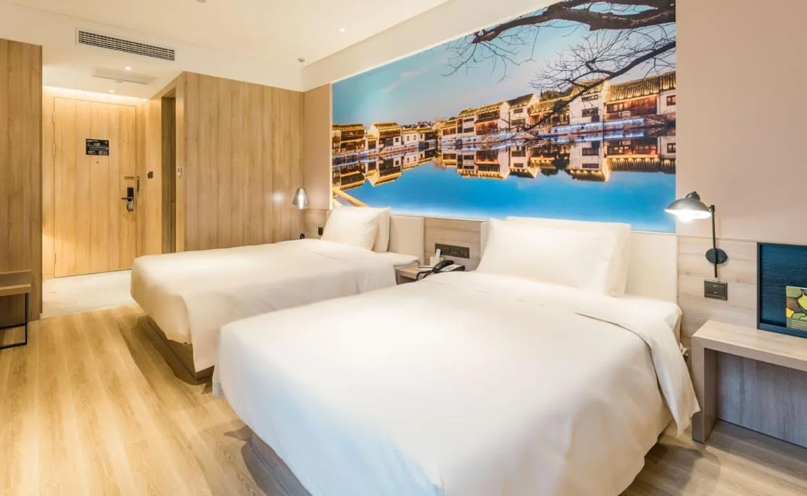 Bed in Atour Hotel Wuxi Sanyang Plaza