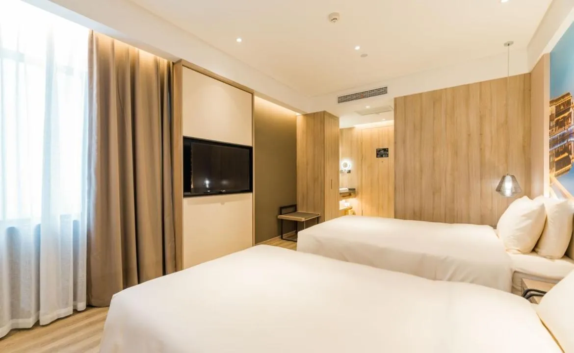 Bed in Atour Hotel Wuxi Sanyang Plaza