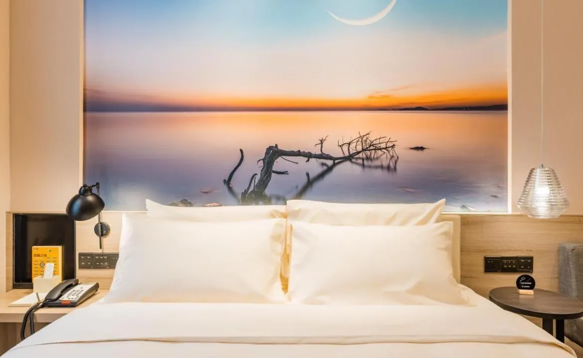 Bed in Atour Hotel Wuxi Sanyang Plaza