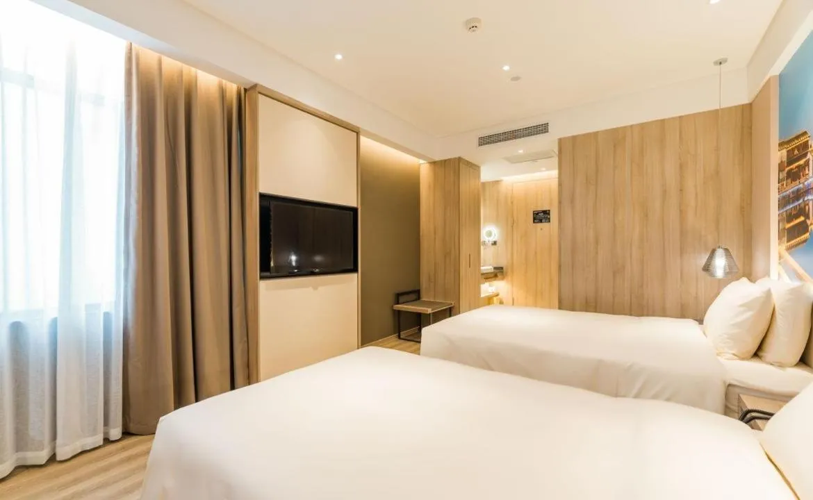 Bed in Atour Hotel Wuxi Sanyang Plaza