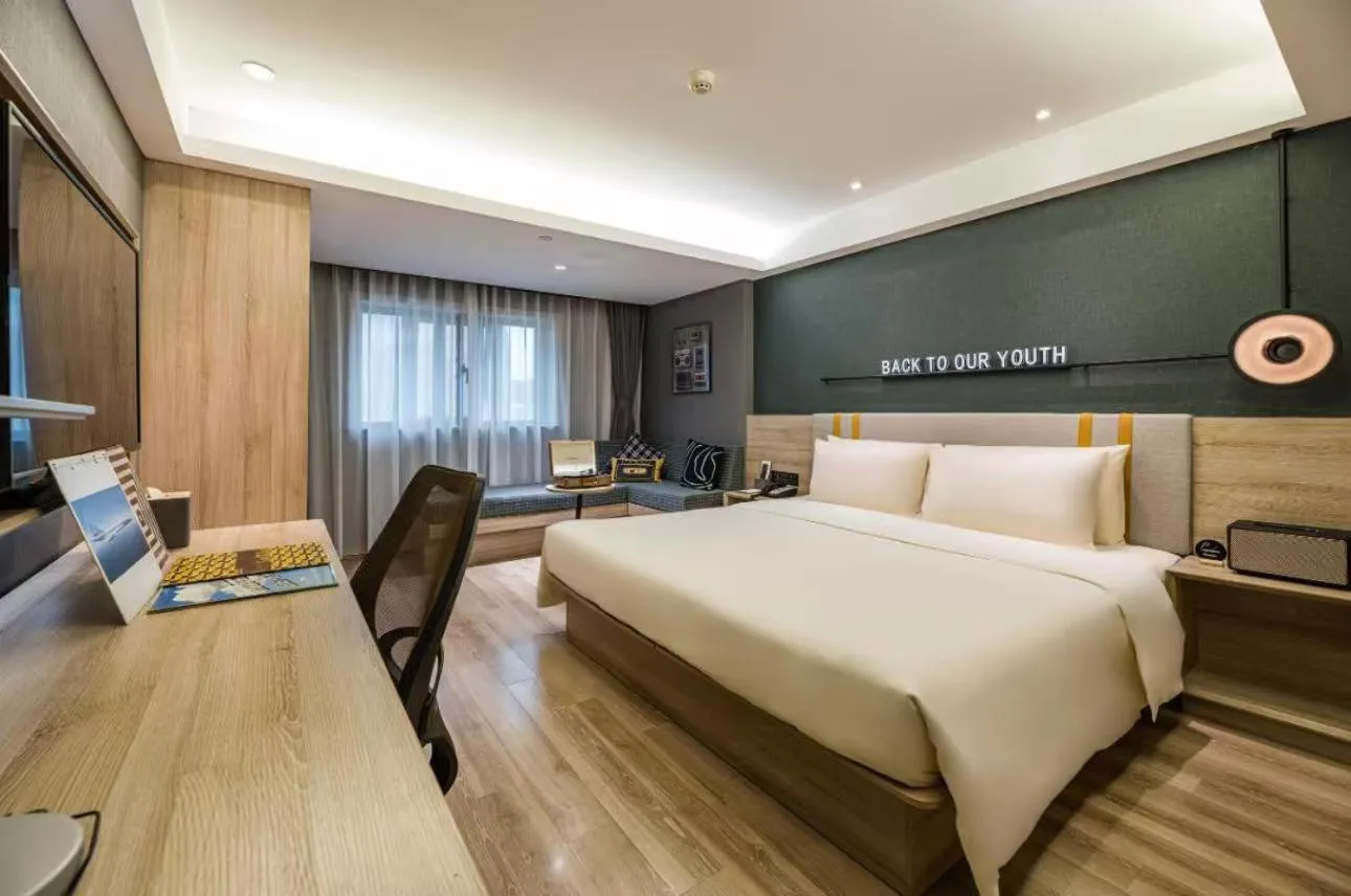 Bed in Atour Music Hotel Hangzhou West Lake