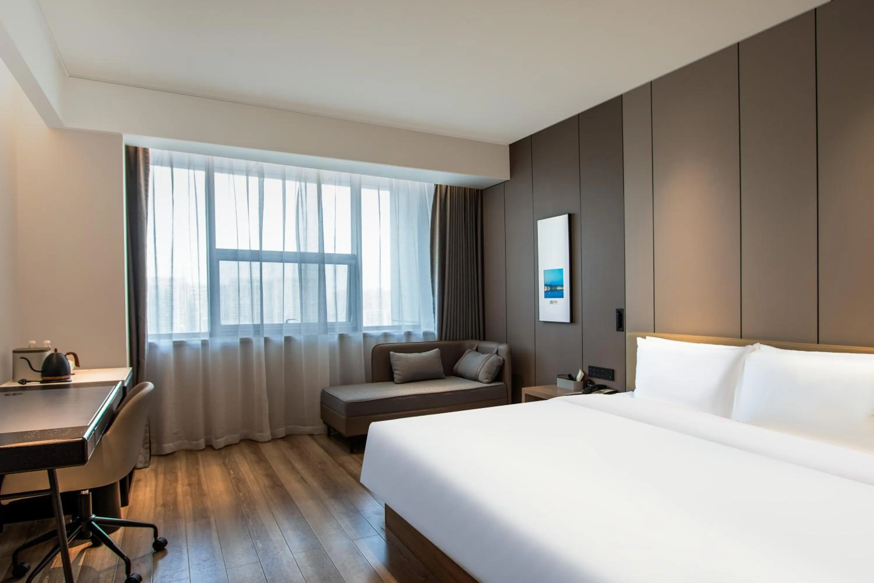 Photo of the whole room, Bed in Atour Hotel Hangzhou Xiaoshan Peoples Square