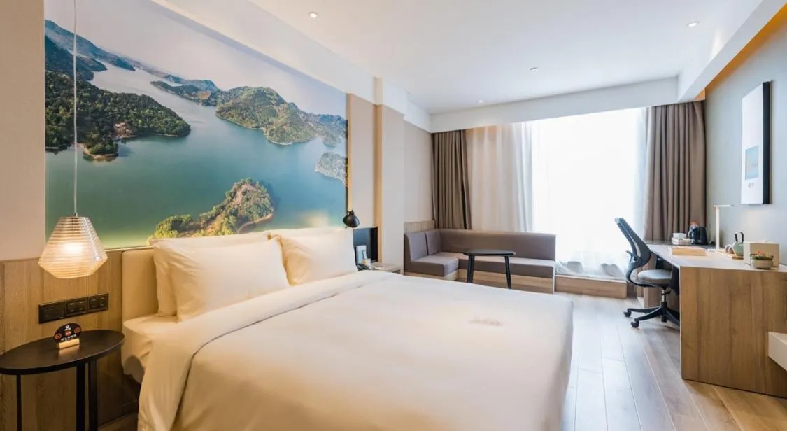 Bed in Atour Hotel Ningbo International Convention and Exhibition Center