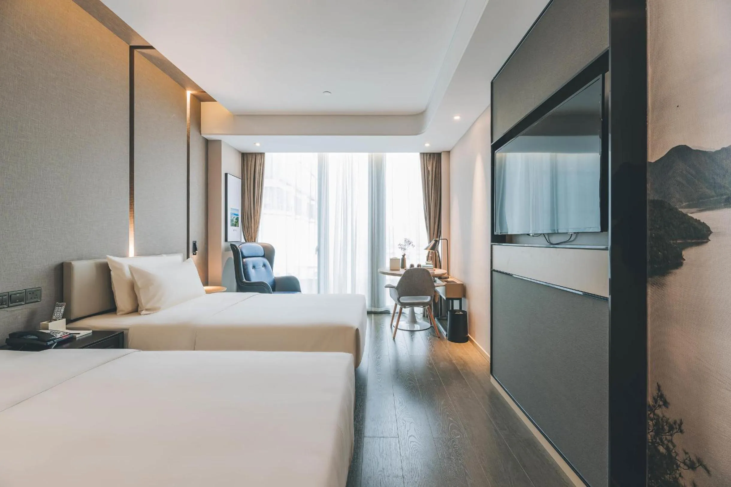 Bed in Atour Hotel Ningbo Sanjiangkou Bund Book City