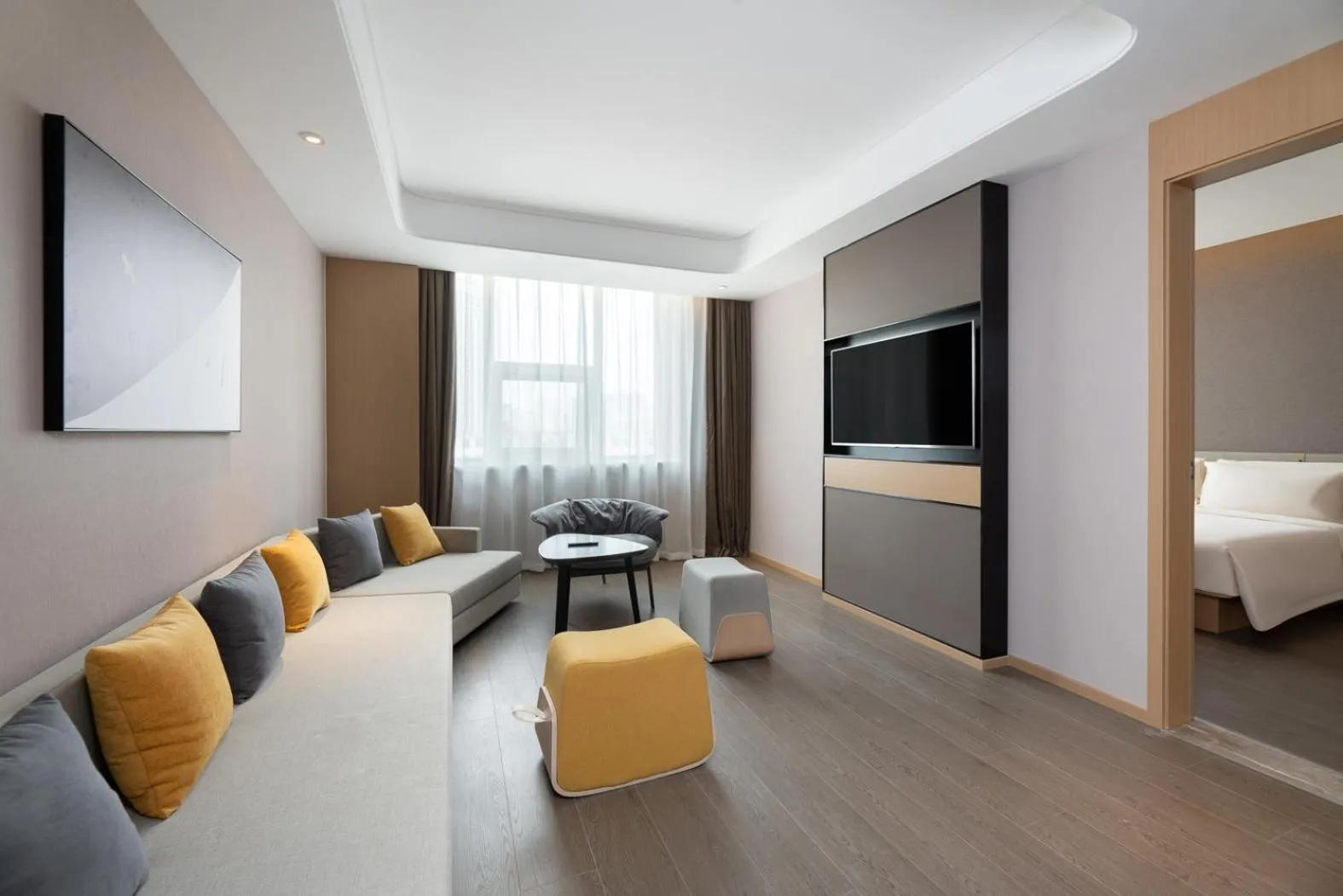 Living room, Bed in Atour S Hotel Xinghai Square