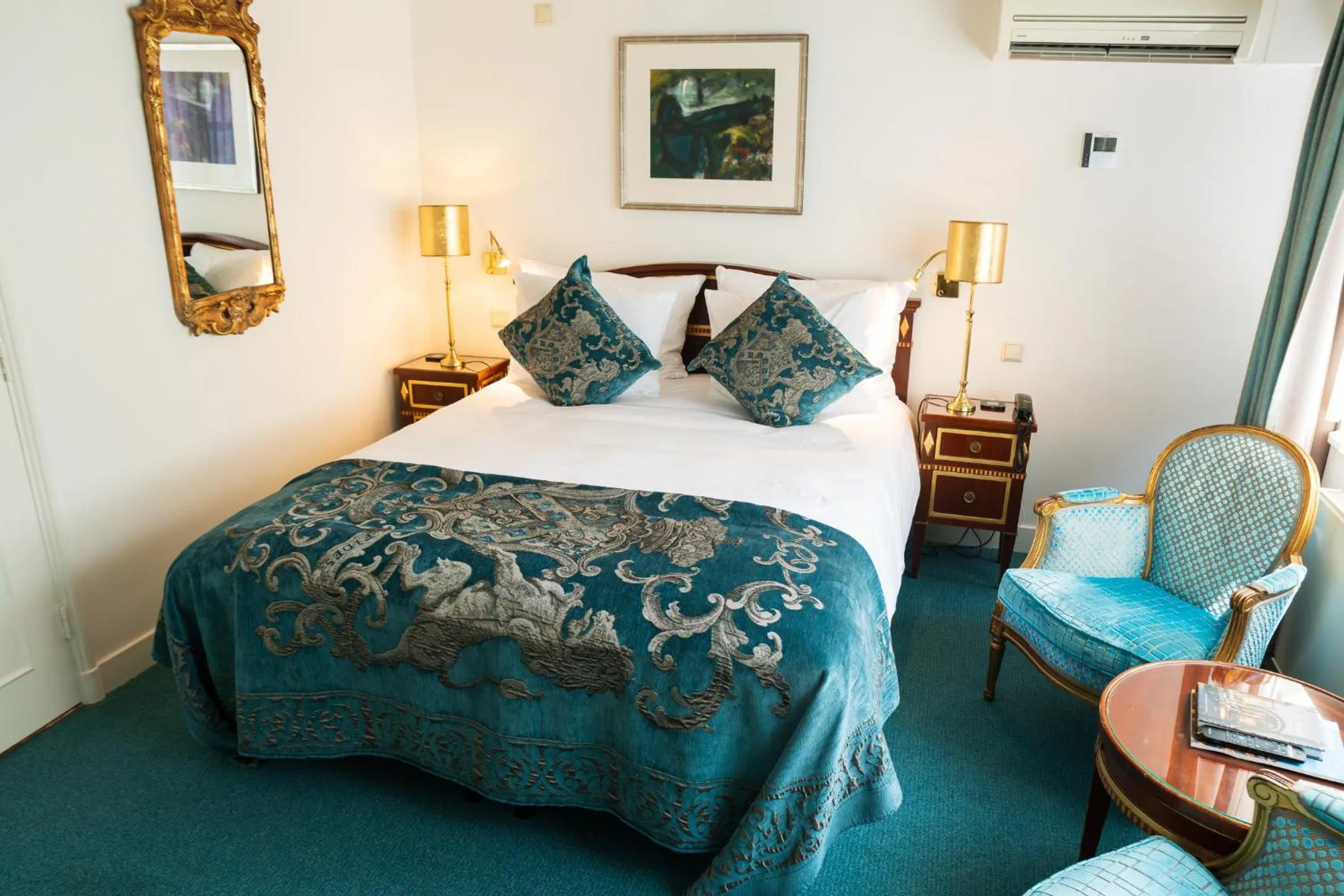 Bed in Ambassade Hotel