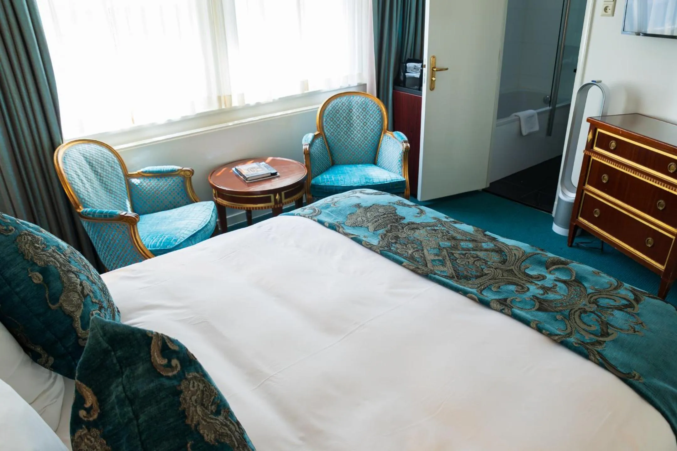 Bed in Ambassade Hotel