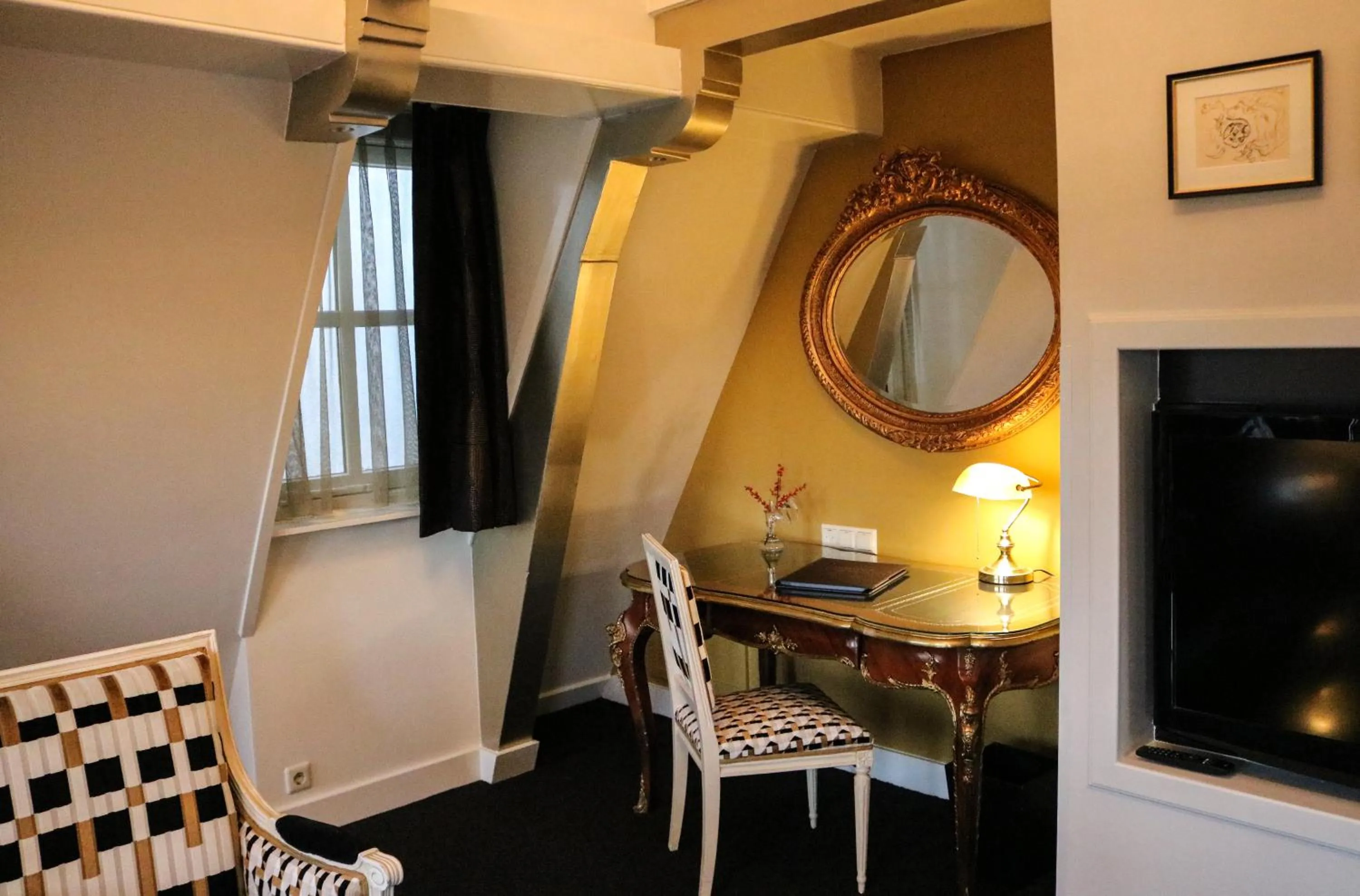 Seating area in Ambassade Hotel