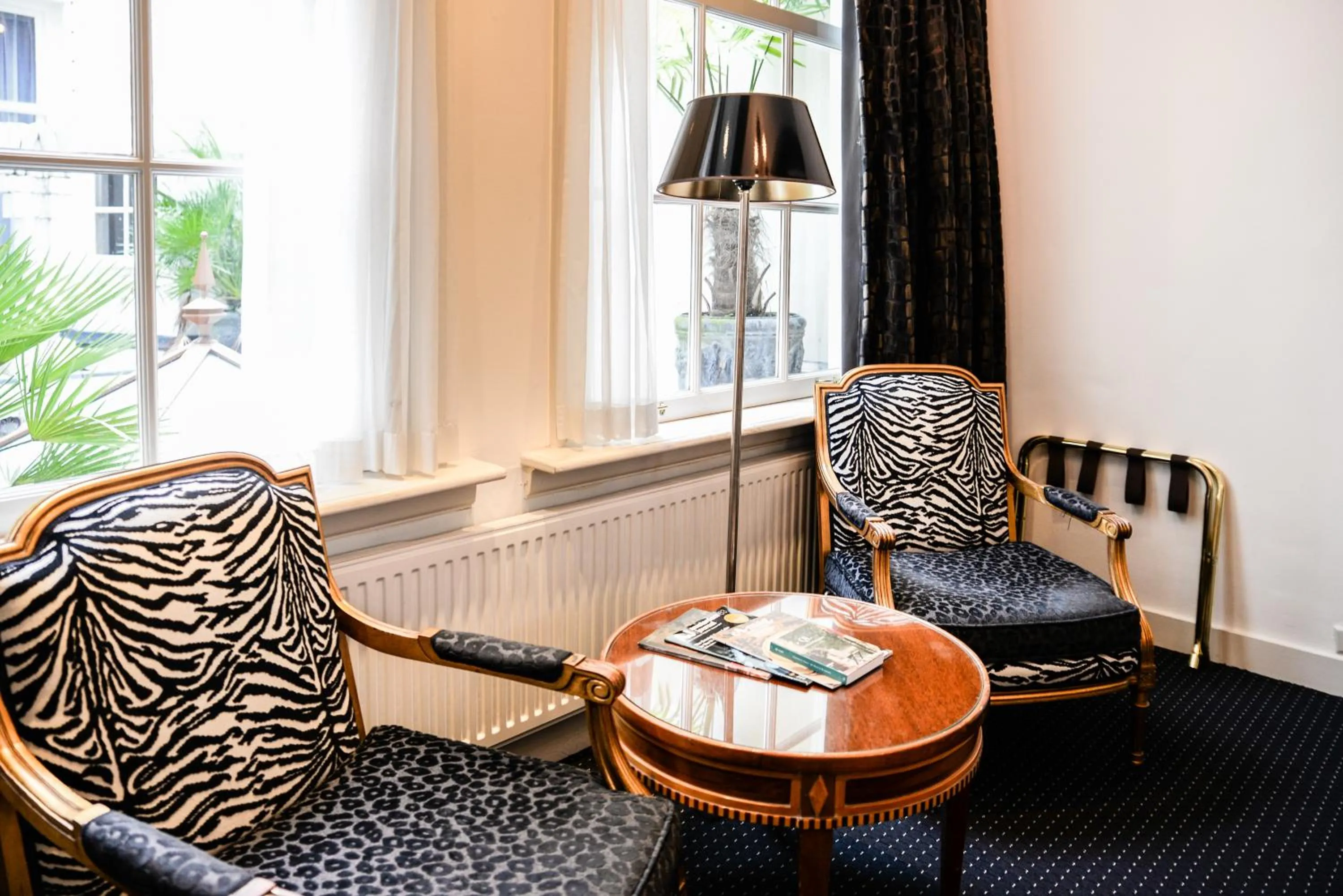 Seating area in Ambassade Hotel