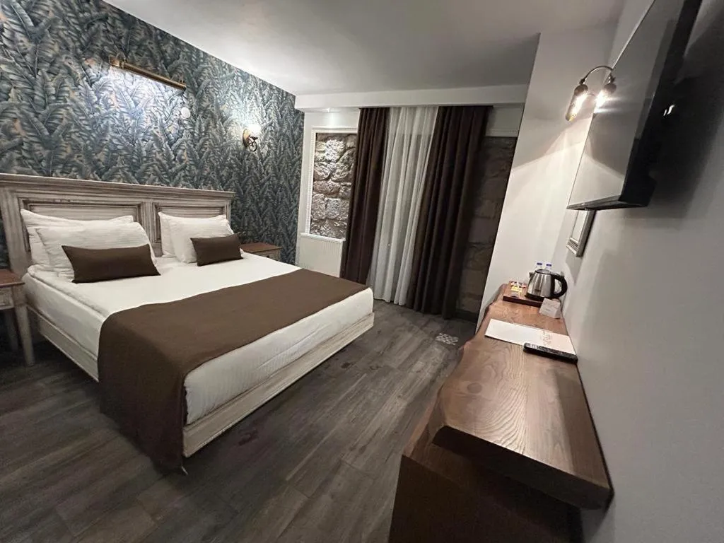 Bed in Assos Troy Port Hotel